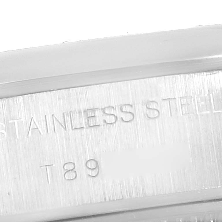 This image shows a close-up of the stainless steel inscription on the Rolex Date 69160 Women's Stainless Steel Blue Dial 69160 Women's Stainless Steel Blue Dial model watch casing.