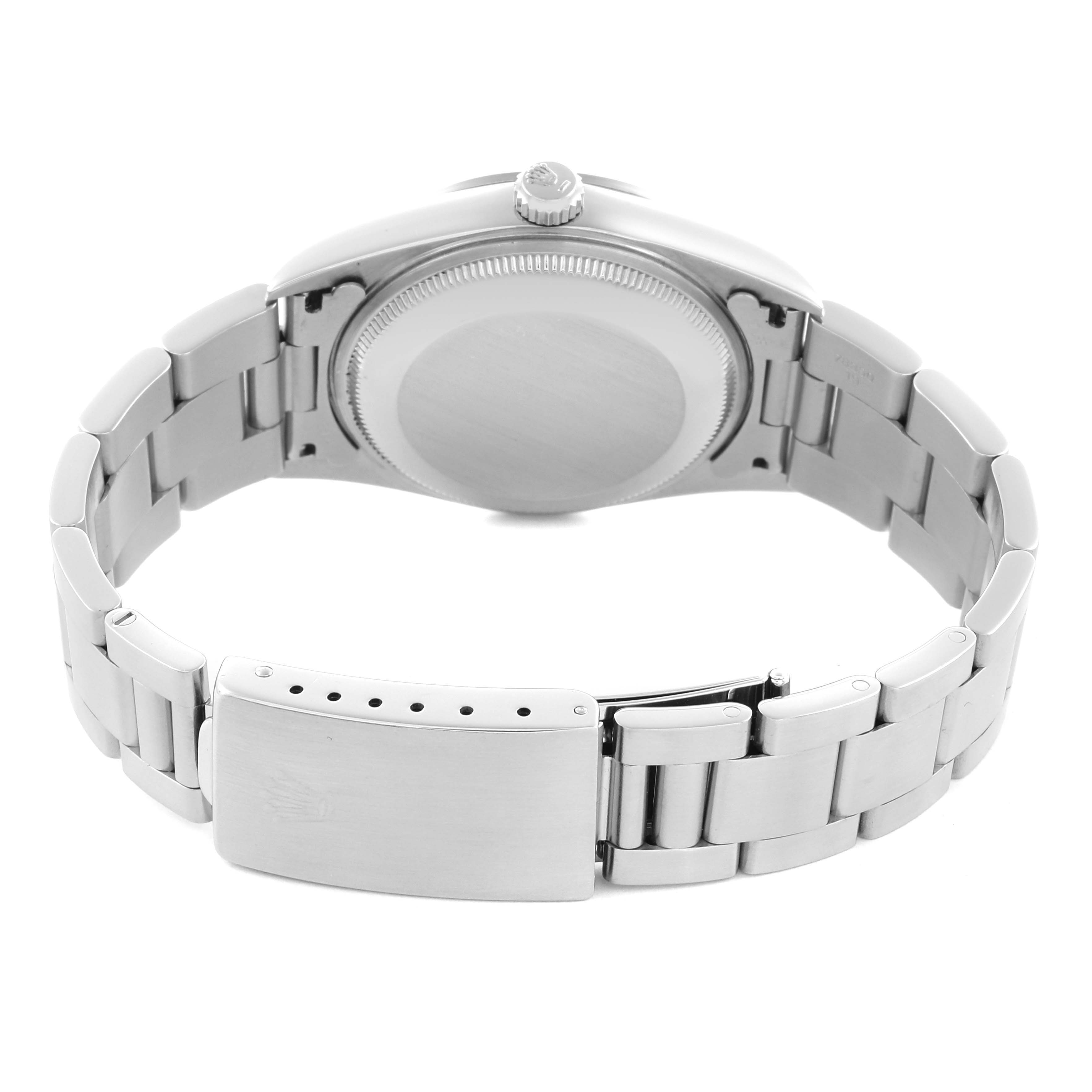 The image shows the back view of a Rolex Date 15200 Men's Stainless Steel White Dial 15200 Men's Stainless Steel White Dial model watch, highlighting the case back, crown, and bracelet clasp.