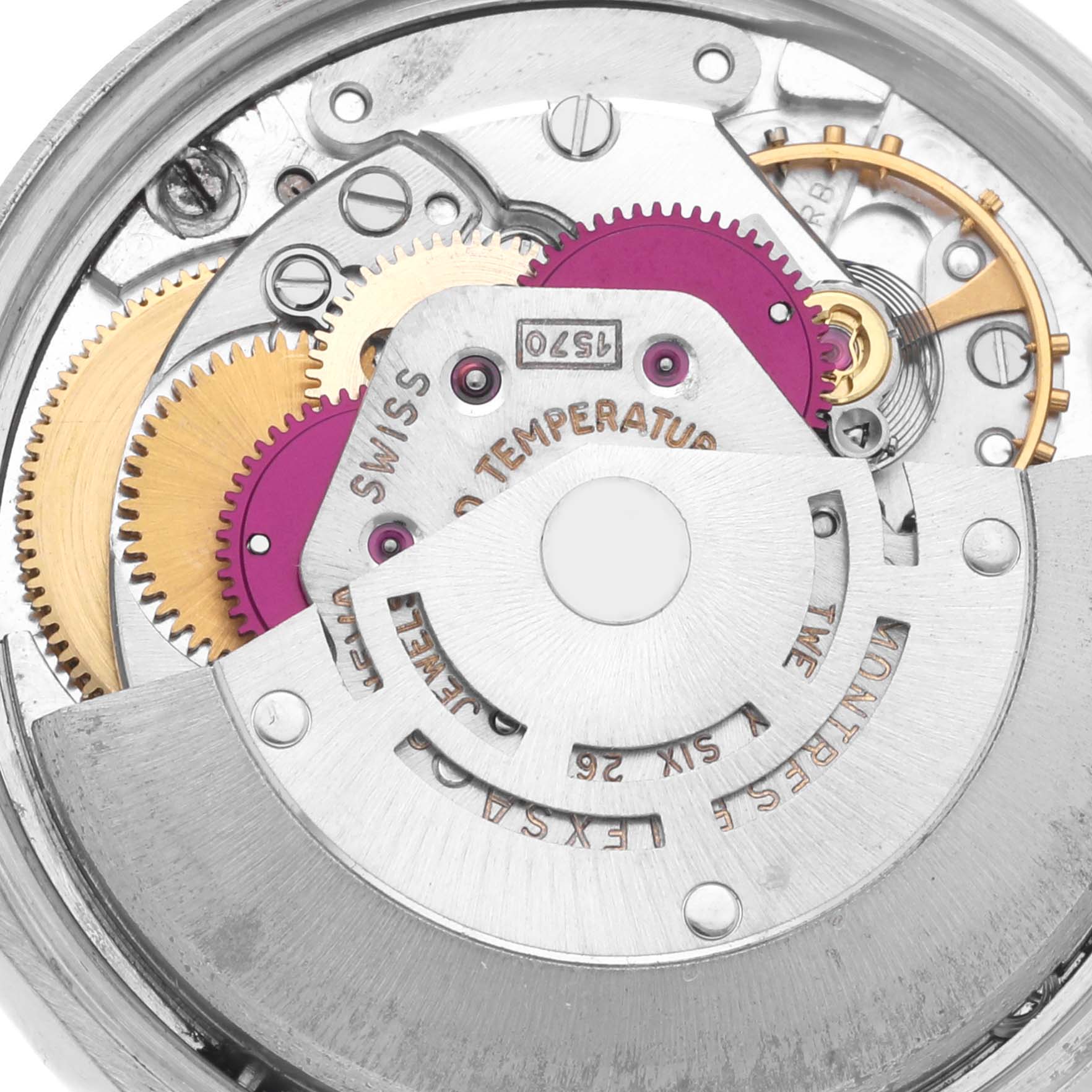 This image shows an overhead view of the internal mechanics of a Rolex Vintage Collection 1500 Men's Stainless Steel Silver Dial 1500 Men's Stainless Steel Silver Dial watch, highlighting gears and rotors.