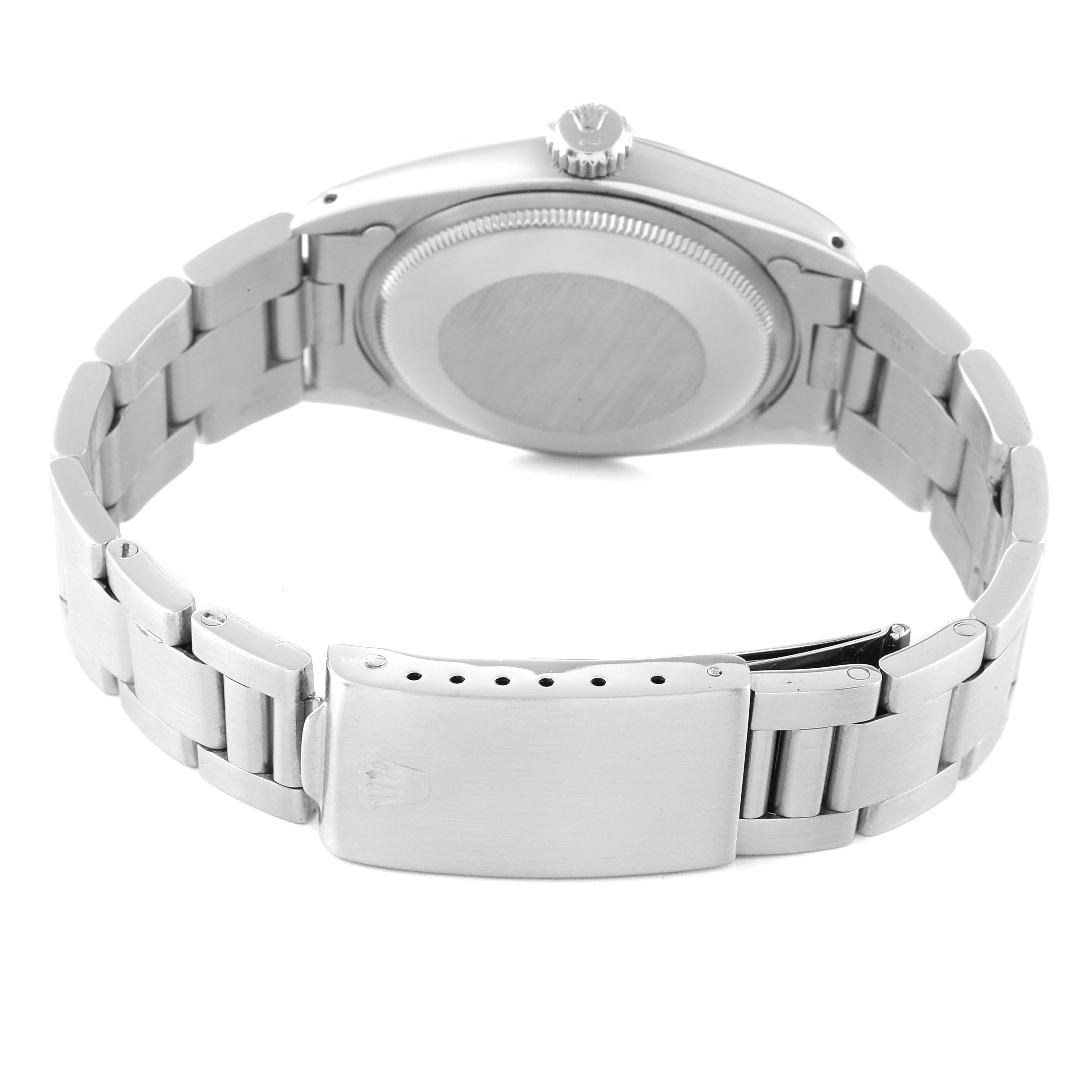 The image shows the back of a Rolex Date 1500 Men
s Stainless Steel Black Dial 1500 Men
s Stainless Steel Black Dial model watch, focusing on its case back, crown, and bracelet with a clasp.