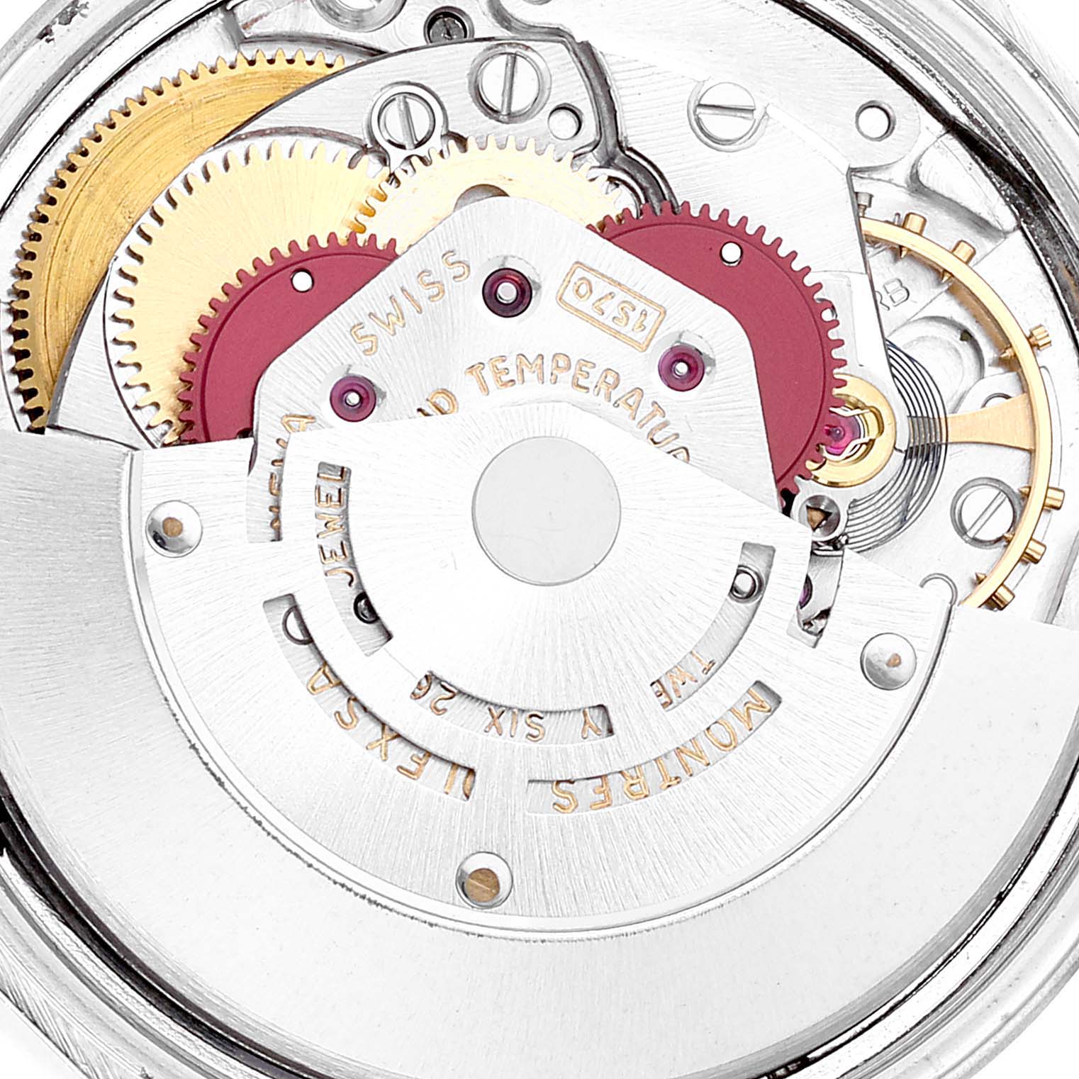 This image shows the intricate inner mechanisms and components of the Rolex Vintage Collection 1505 Men's Steel and Gold (two tone) Champagne Dial 1505 Men's Steel and Gold (two tone) Champagne Dial model watch from a close-up angle.