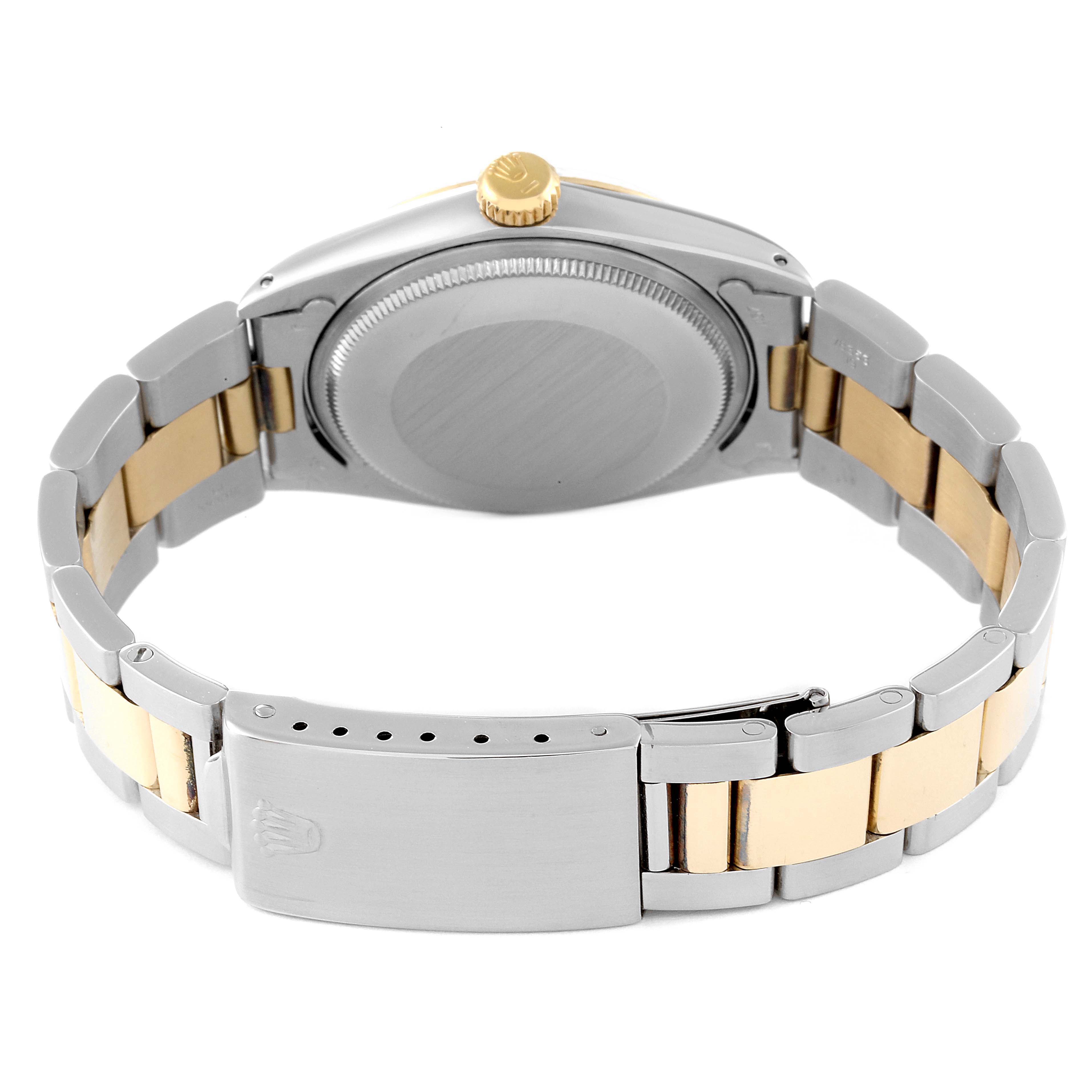 The image displays the backside, crown, and bracelet of the Rolex Vintage Collection 1505 Men's Steel and Gold (two tone) Champagne Dial 1505 Men's Steel and Gold (two tone) Champagne Dial model watch.