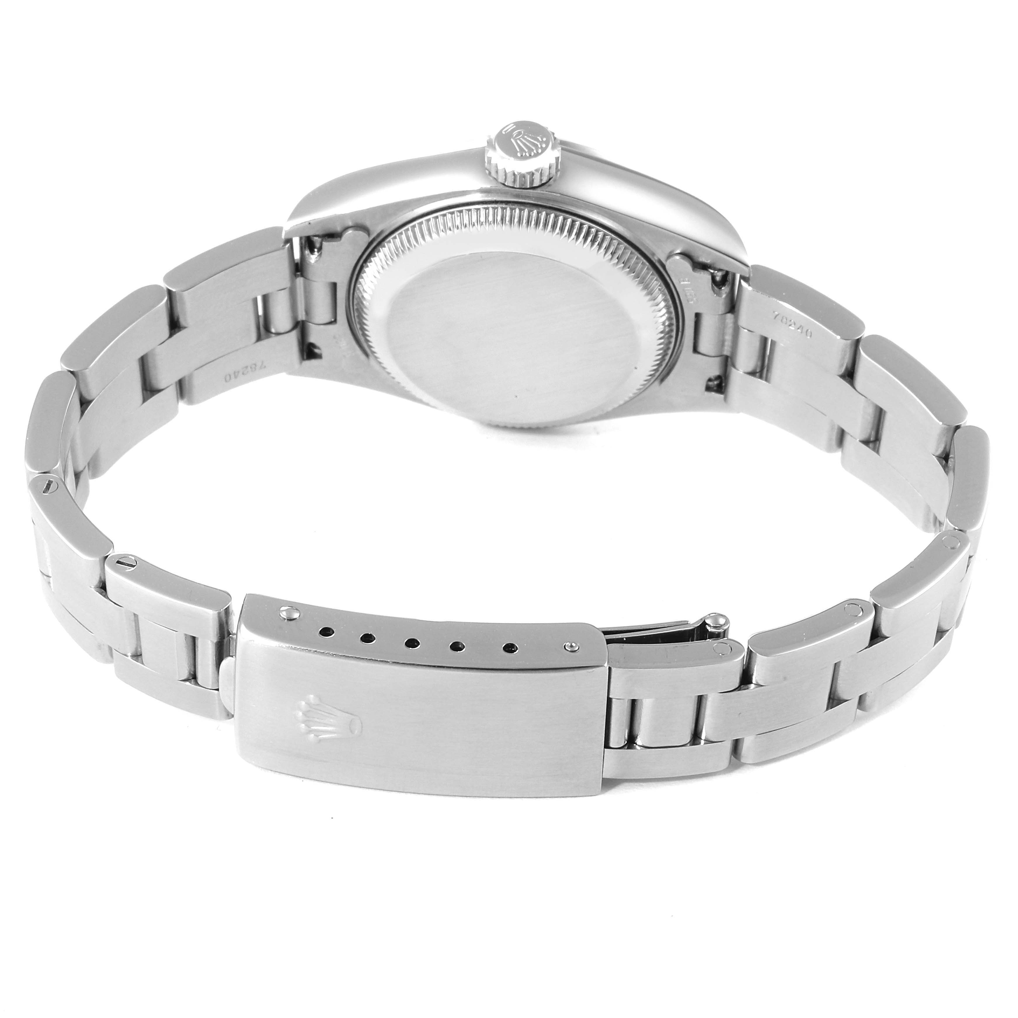 This image shows the back case and metal bracelet of a Rolex Date 79160 Women
s Stainless Steel White Dial 79160 Women
s Stainless Steel White Dial model watch from an underside angle.