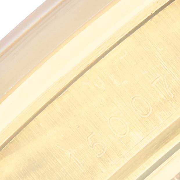 The image shows a close-up of the serial number engraving on the casing of a Rolex Vintage Collection 15007 Men's Yellow Gold Champagne Dial 15007 Men's Yellow Gold Champagne Dial model.