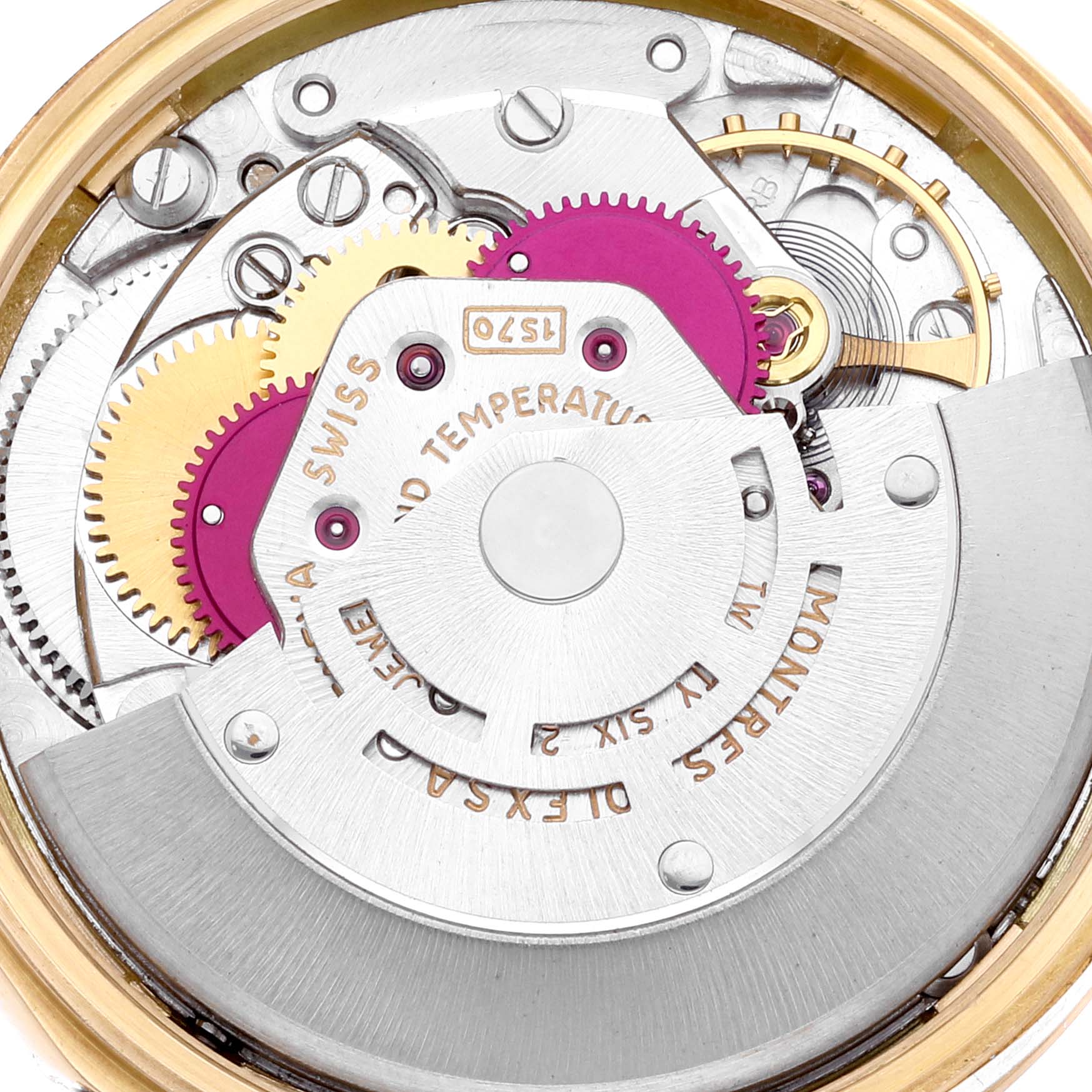 This image shows the intricate internal mechanism of the Rolex Vintage Collection 1511 Men's Yellow Gold Champagne Dial 1511 Men's Yellow Gold Champagne Dial model, highlighting gears and components.