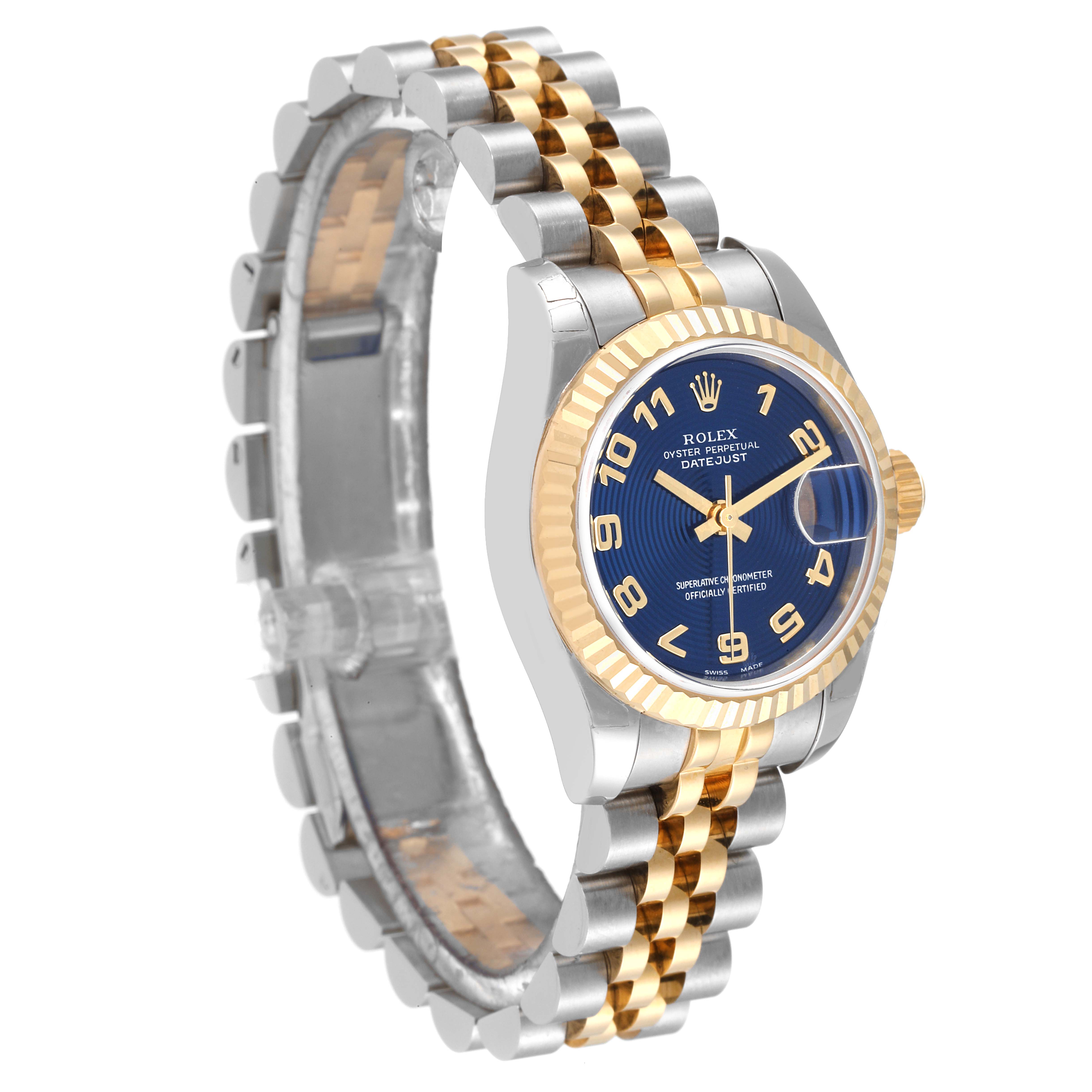 The Rolex Datejust 179173 Women's Steel and Gold (two tone) Blue Dial 179173 Women's Steel and Gold (two tone) Blue Dial watch is shown at an angled view, highlighting the band, case, and blue dial with gold numerals.
