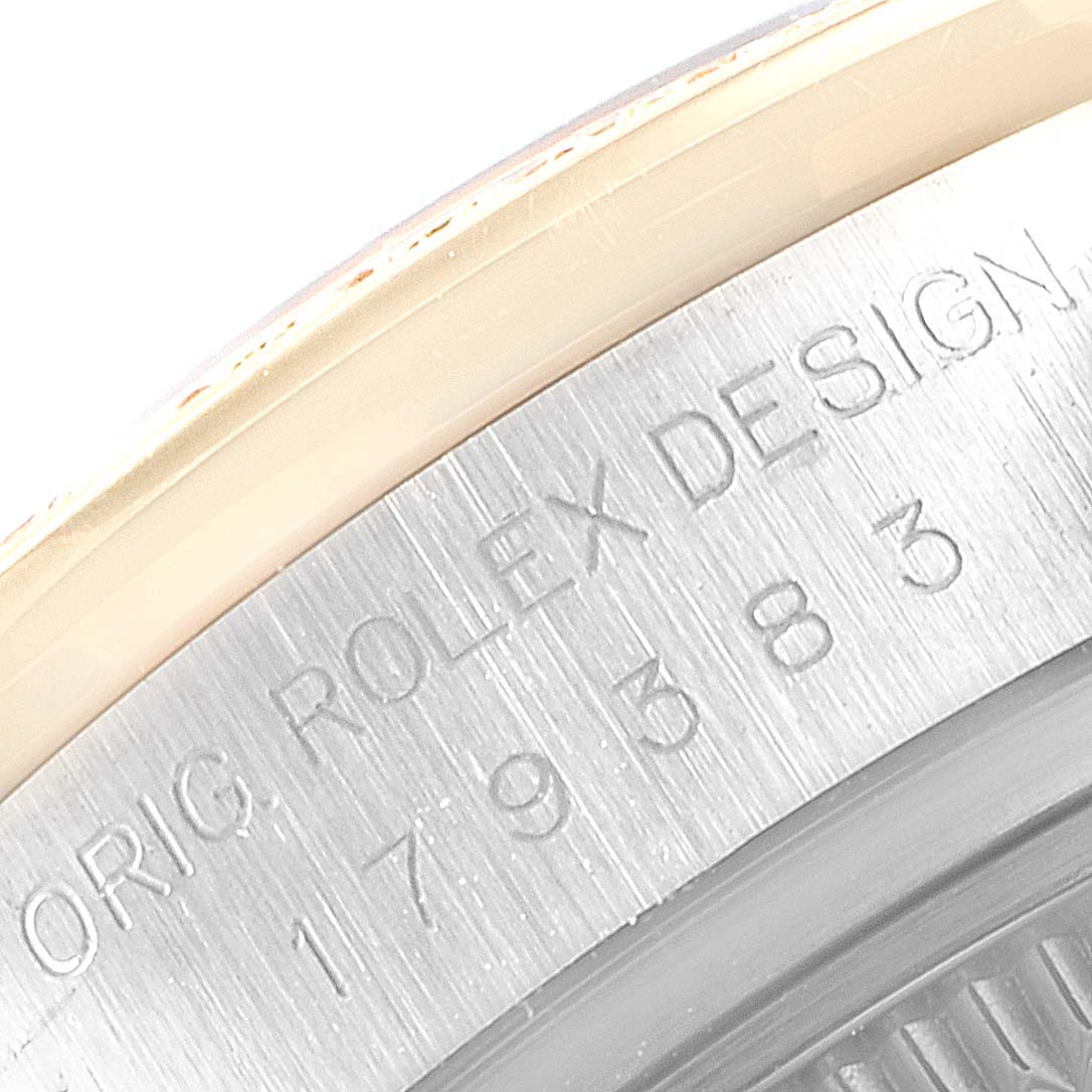 This image shows a close-up of the engraved edge on a Rolex Datejust 179383 Women's Steel and Gold (two tone) Champagne Dial 179383 Women's Steel and Gold (two tone) Champagne Dial.
