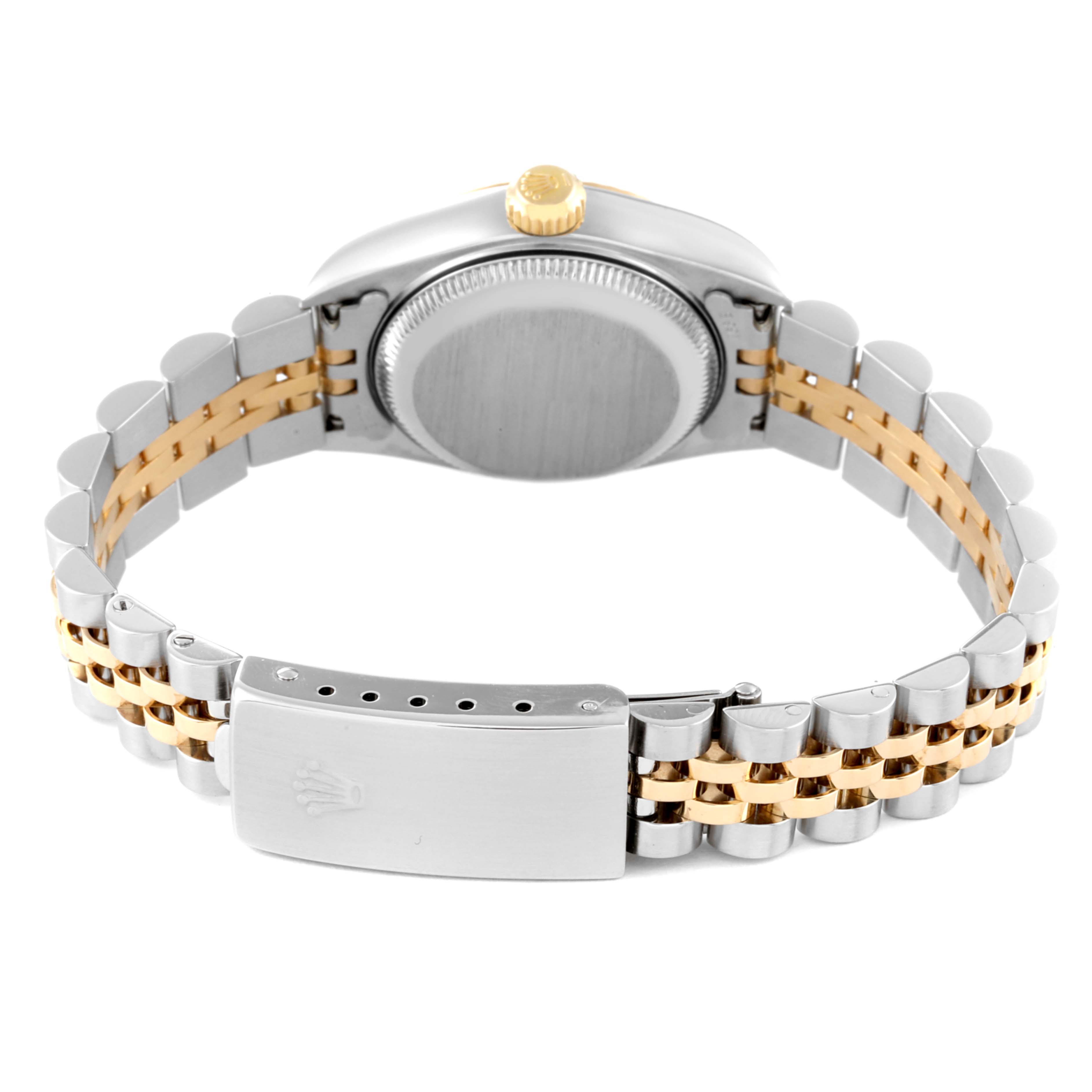 This image shows the underside of a Rolex Datejust 79173 Women's Steel and Gold (two tone) White Dial 79173 Women's Steel and Gold (two tone) White Dial watch, focusing on its two-tone bracelet and closed clasp.
