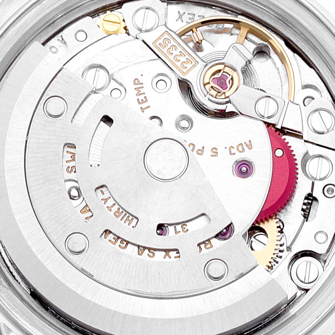 The image shows a close-up view of the movement mechanism of a Rolex Datejust 79173 Women's Steel and Gold (two tone) White Dial 79173 Women's Steel and Gold (two tone) White Dial watch, displaying components like gears and the rotor.