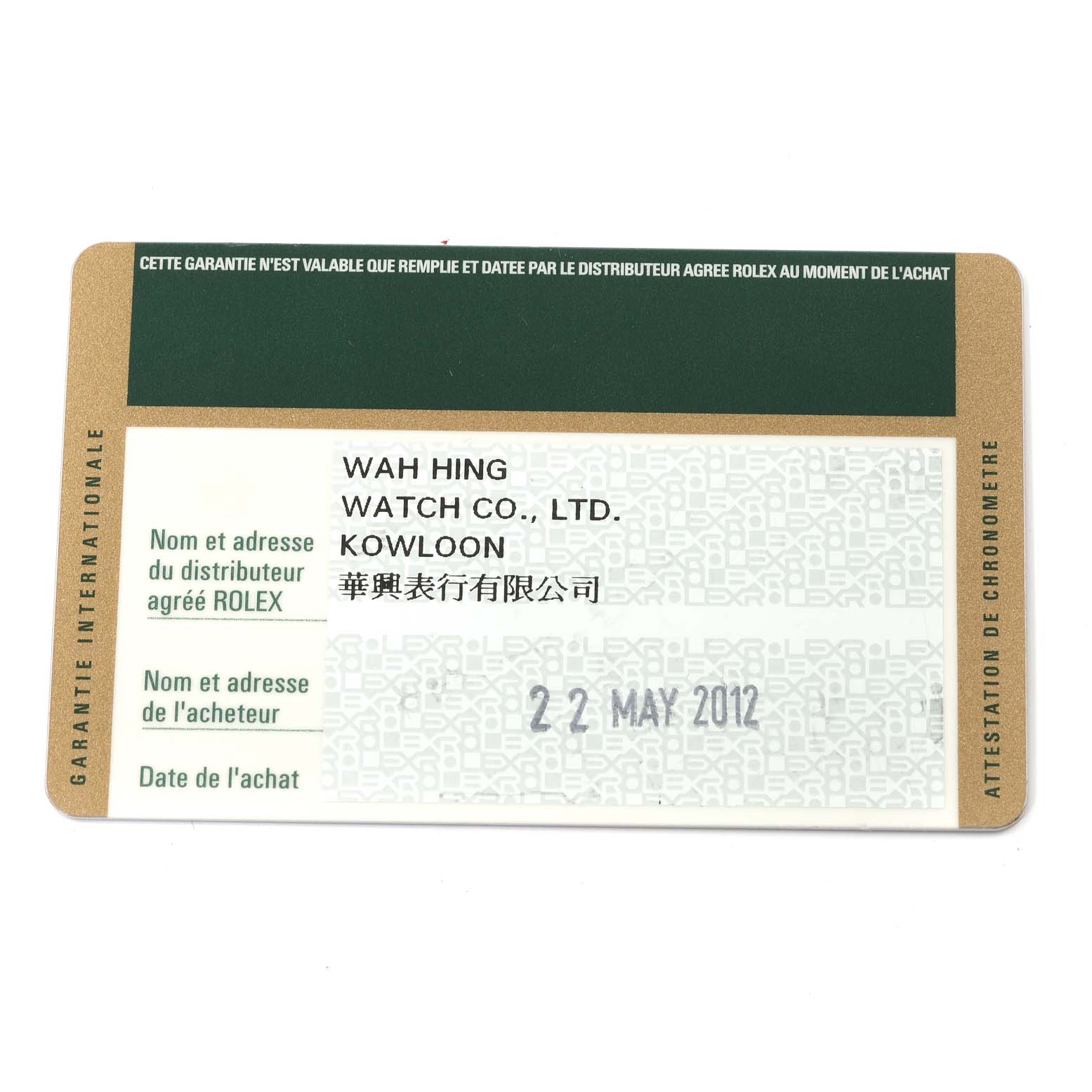 This is a Rolex warranty card detailing the distributor and purchase date for a Mid-Size model.