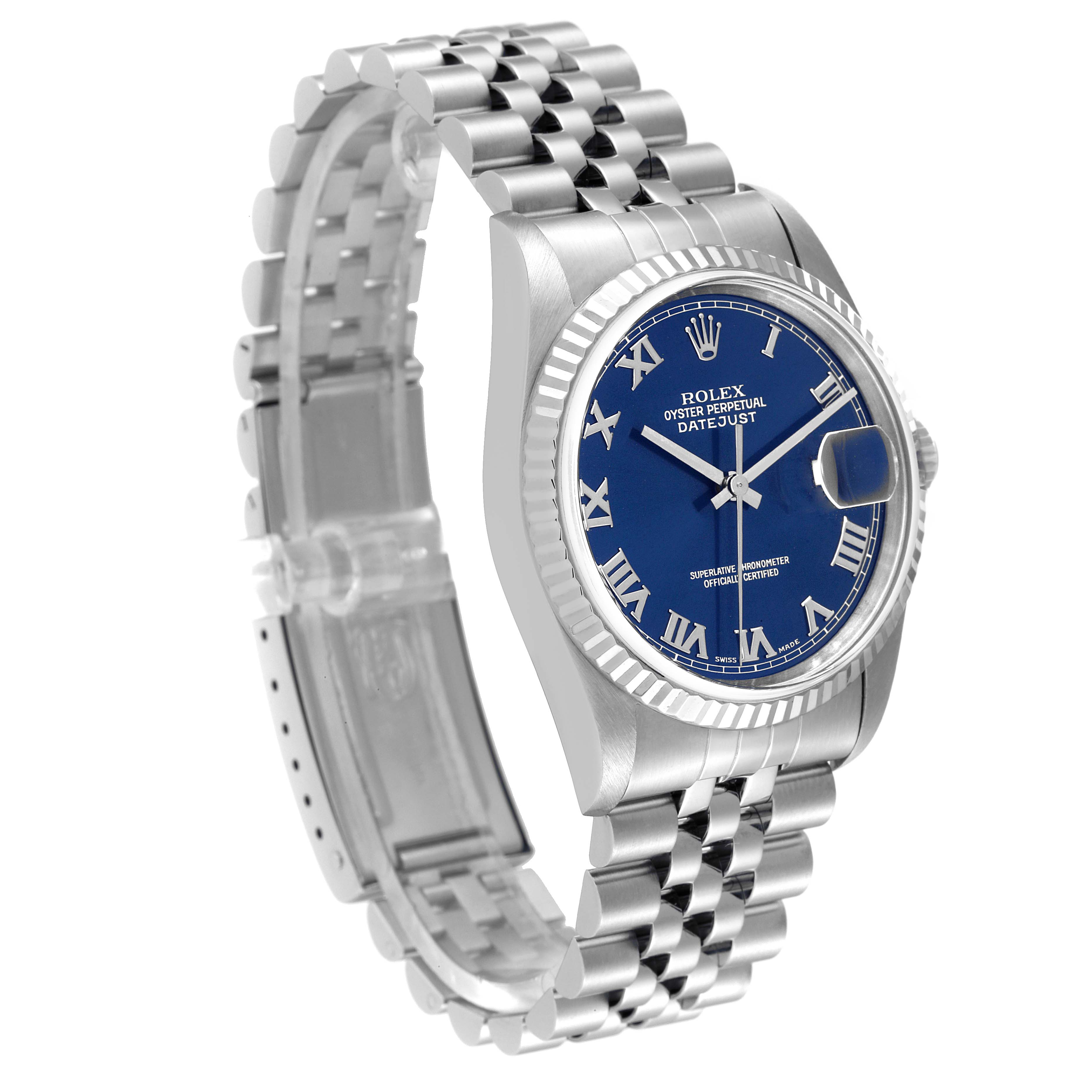 The image shows a Rolex Datejust 16234 Men's Stainless Steel Blue Dial 16234 Men's Stainless Steel Blue Dial watch at an angled side view, highlighting its blue dial, fluted bezel, and Jubilee bracelet.