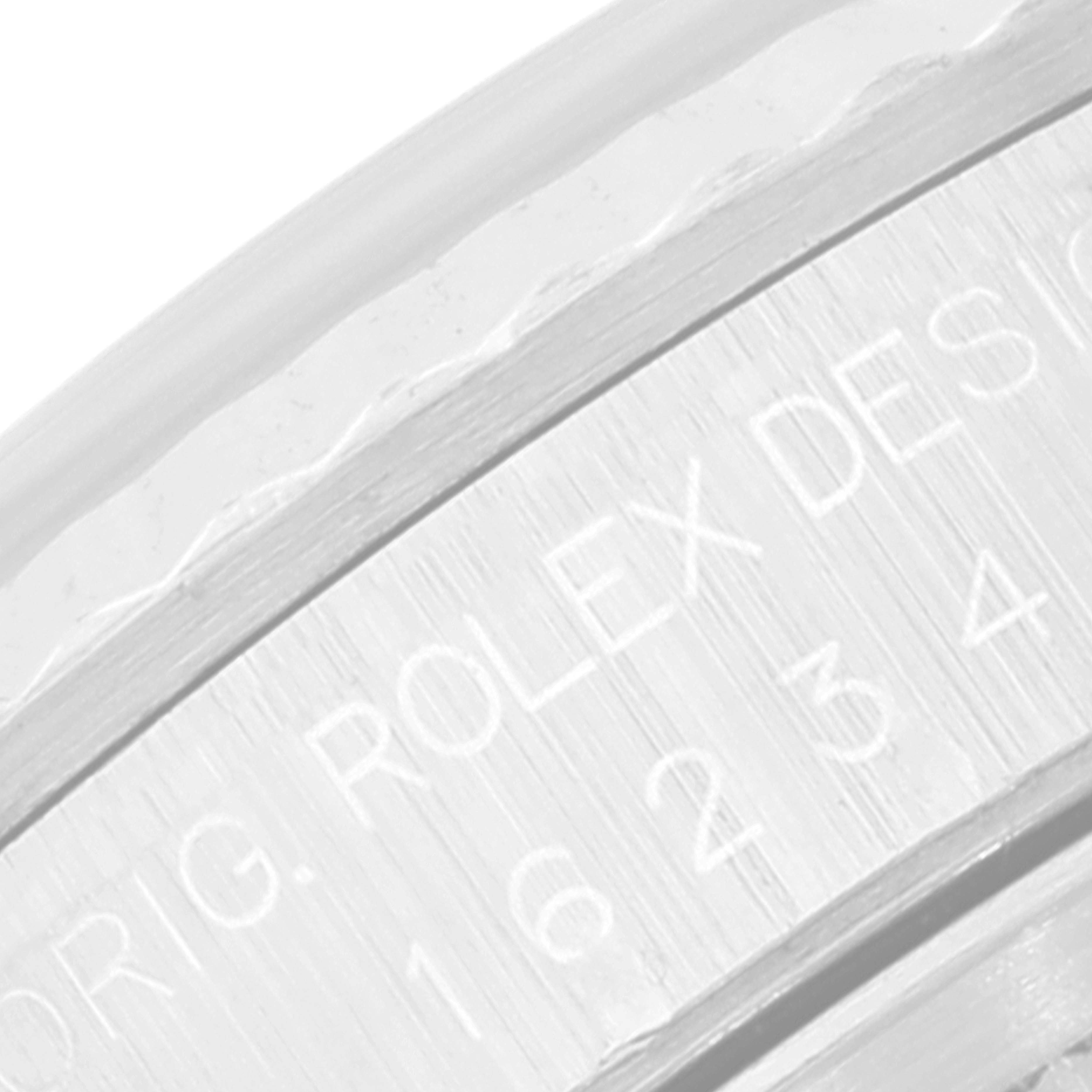 This close-up angle shows the inner bezel engraving of a Rolex Datejust 16234 Men's Stainless Steel Blue Dial 16234 Men's Stainless Steel Blue Dial watch.