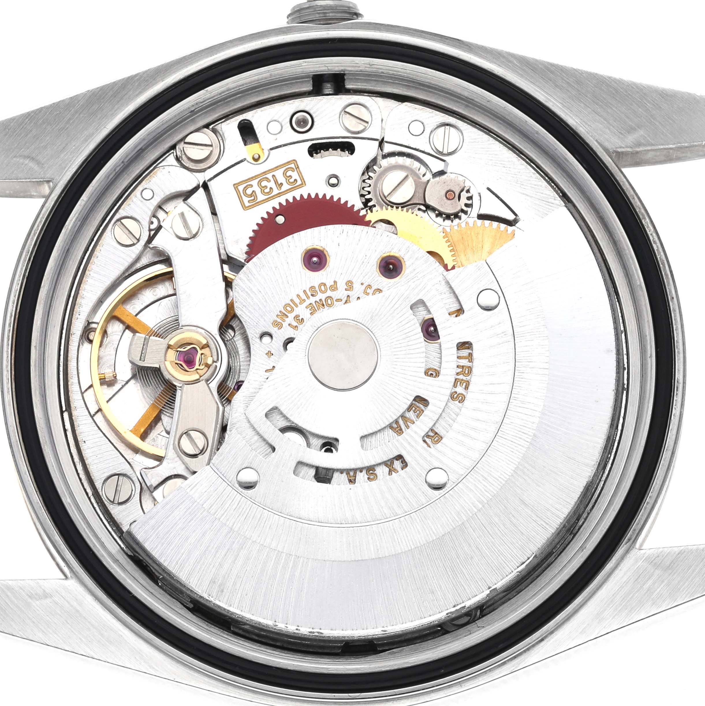 The image shows the interior movement of a Rolex Datejust 16233 Men's Steel and Gold (two tone) Champagne Dial 16233 Men's Steel and Gold (two tone) Champagne Dial watch from a top-down angle, exposing gears and mechanisms.