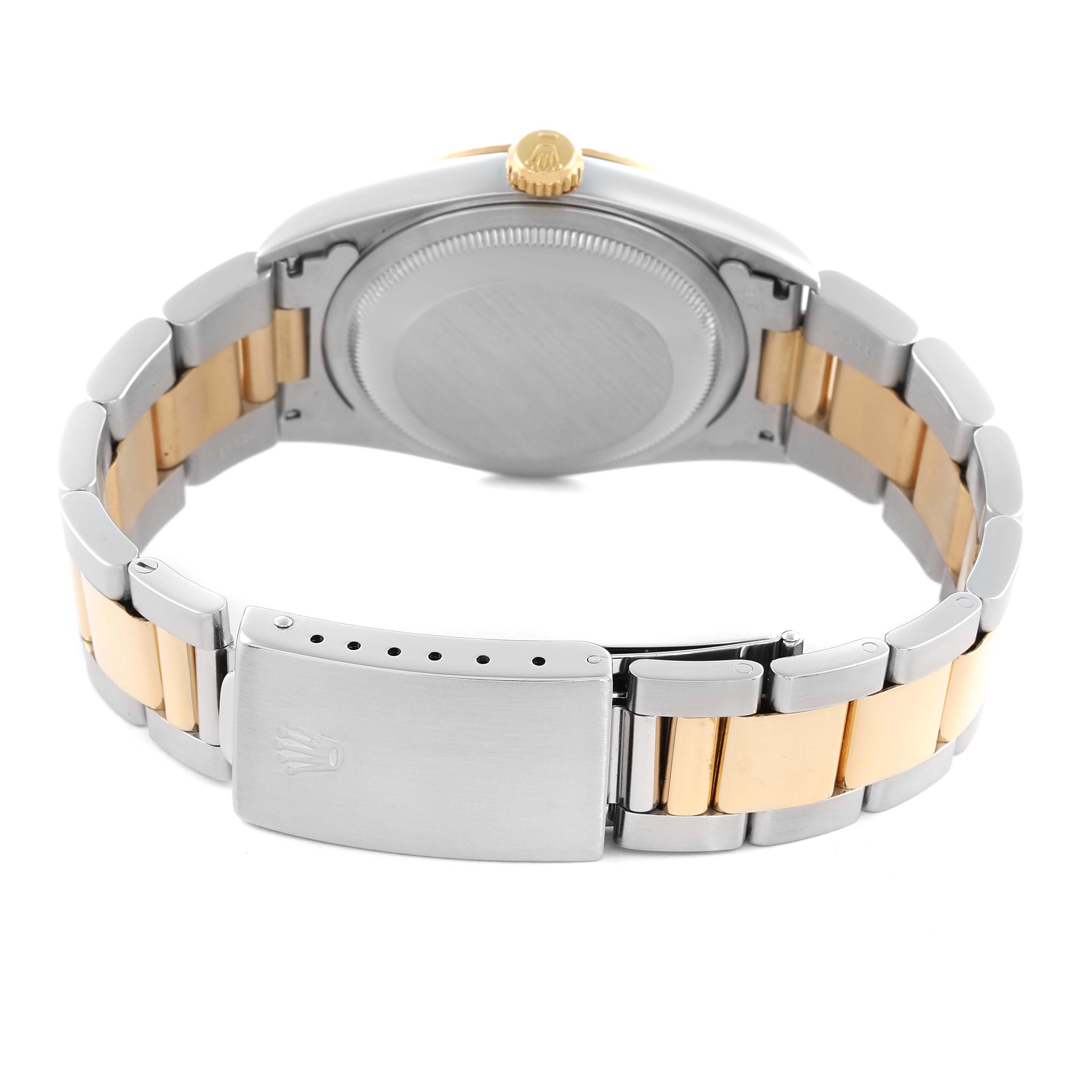 The Rolex Datejust 16233 Men's Steel and Gold (two tone) Champagne Dial 16233 Men's Steel and Gold (two tone) Champagne Dial watch is shown from the back, displaying the bracelet, clasp, and case back.