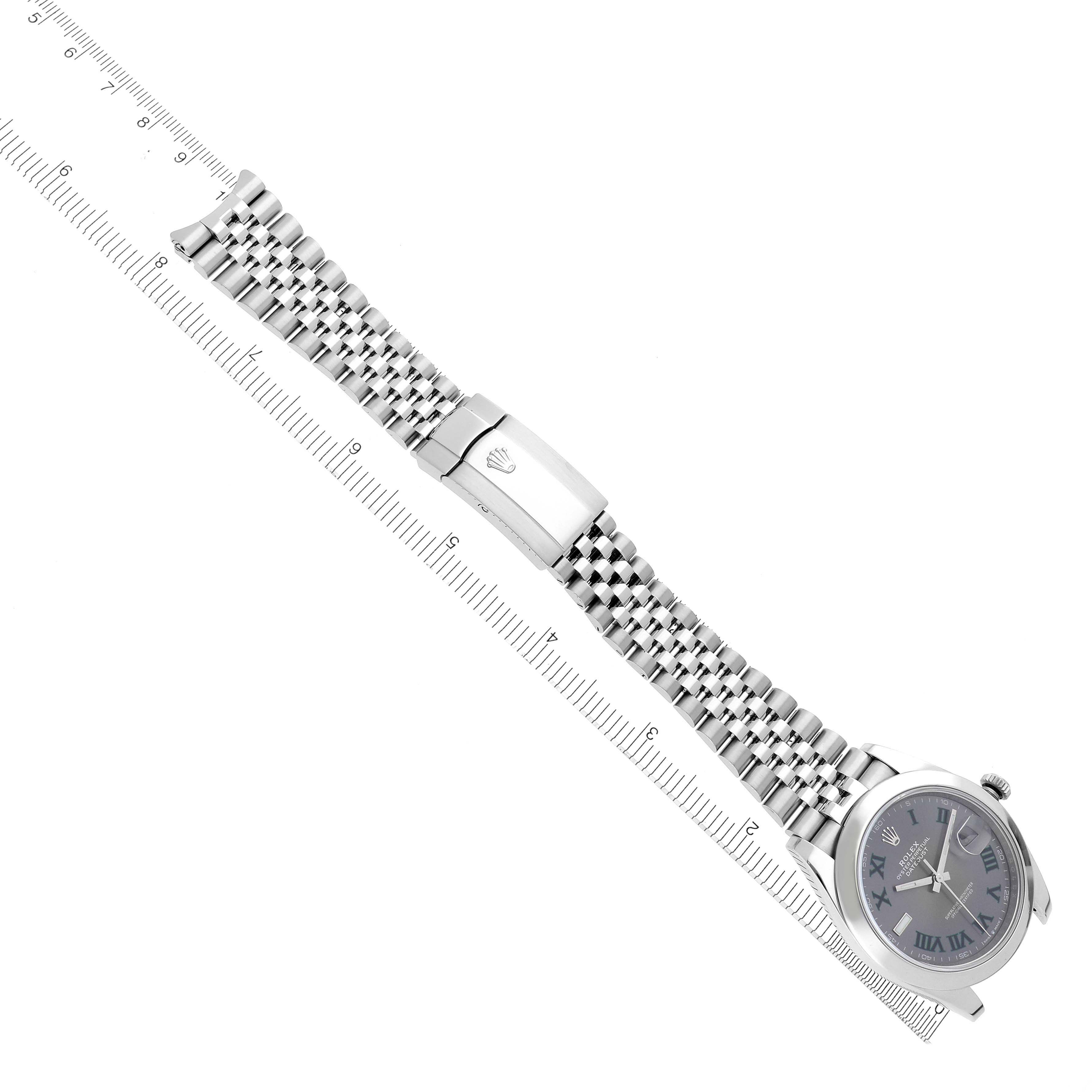 The image shows a Rolex Datejust 126300 Men
s Stainless Steel Grey Dial 126300 Men
s Stainless Steel Grey Dial 41 watch partially unfolded, highlighting the bracelet and clasp with a ruler for scale.