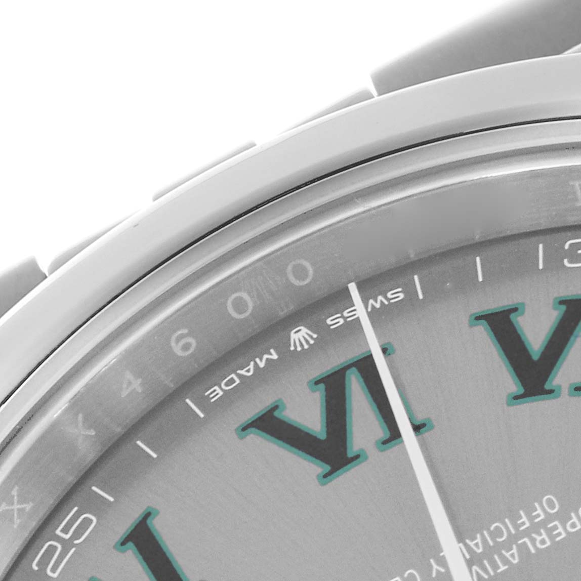 The image shows a close-up of the bezel and dial of a Rolex Datejust 126300 Men
s Stainless Steel Grey Dial 126300 Men
s Stainless Steel Grey Dial 41, highlighting the Roman numerals and minute markers.