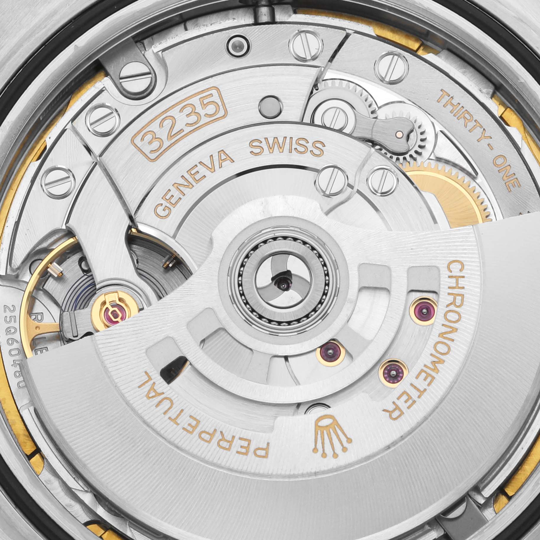 The image shows the intricate movement and rotor of a Rolex Datejust 41 126333 Men's Steel and Gold (two tone) Mother of Pearl Dial 126333 Men's Steel and Gold (two tone) Mother of Pearl Dial model, viewed from the back.