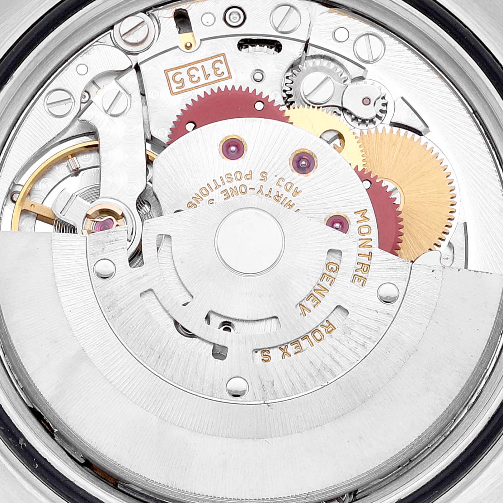 This image shows a close-up of the movement inside a Rolex Datejust 16200 Men's Stainless Steel Blue Dial 16200 Men's Stainless Steel Blue Dial watch, highlighting gears and components.