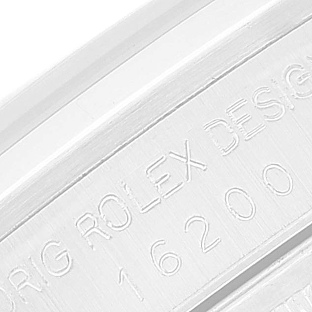 The image shows a close-up of the engraved model number on the inner bezel of a Rolex Datejust 16200 Men's Stainless Steel Blue Dial 16200 Men's Stainless Steel Blue Dial watch.