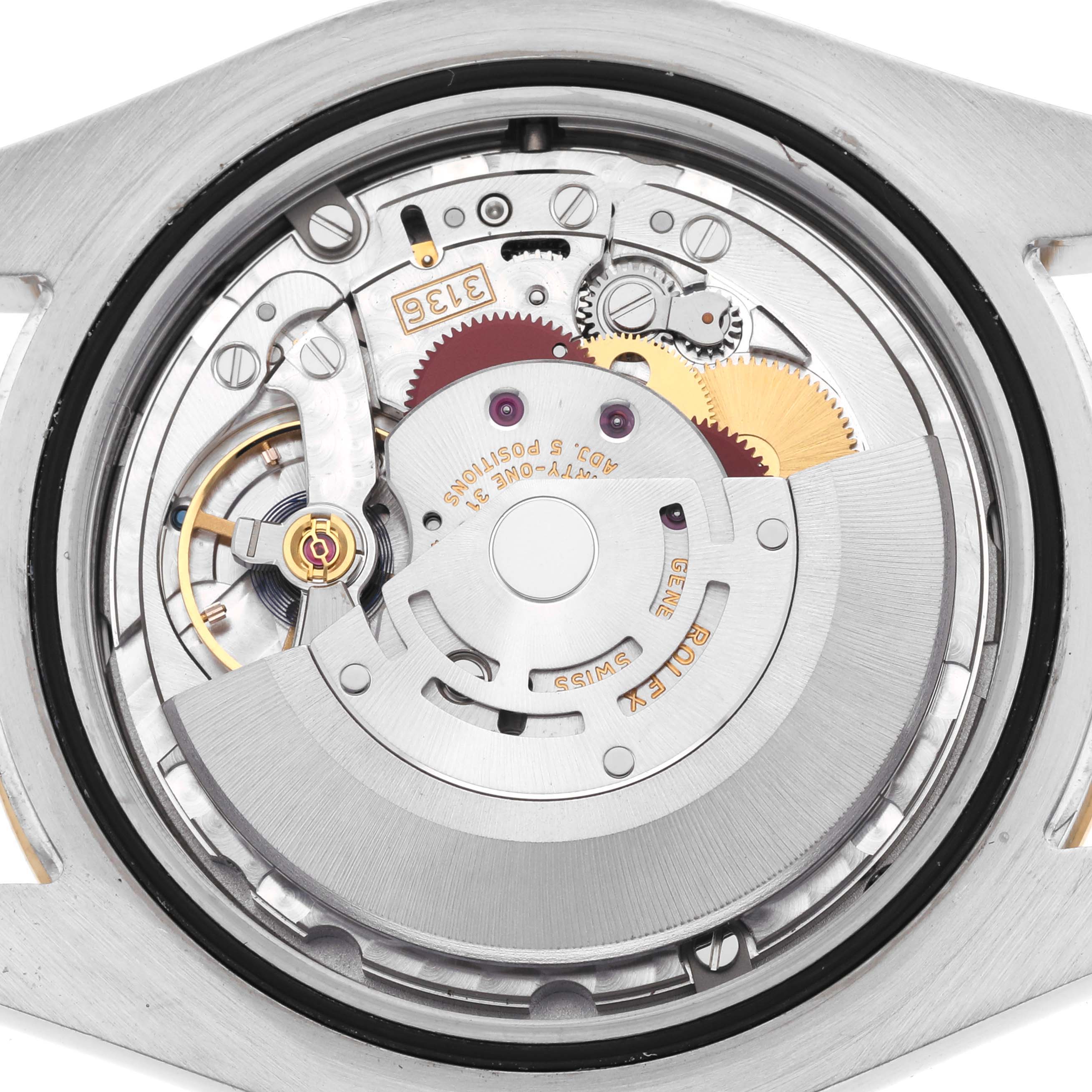 The image shows the movement mechanism of a Rolex Datejust 41 116333 Men's Steel and Gold (two tone) Black Dial 116333 Men's Steel and Gold (two tone) Black Dial from a back angle, highlighting gears and rotors.