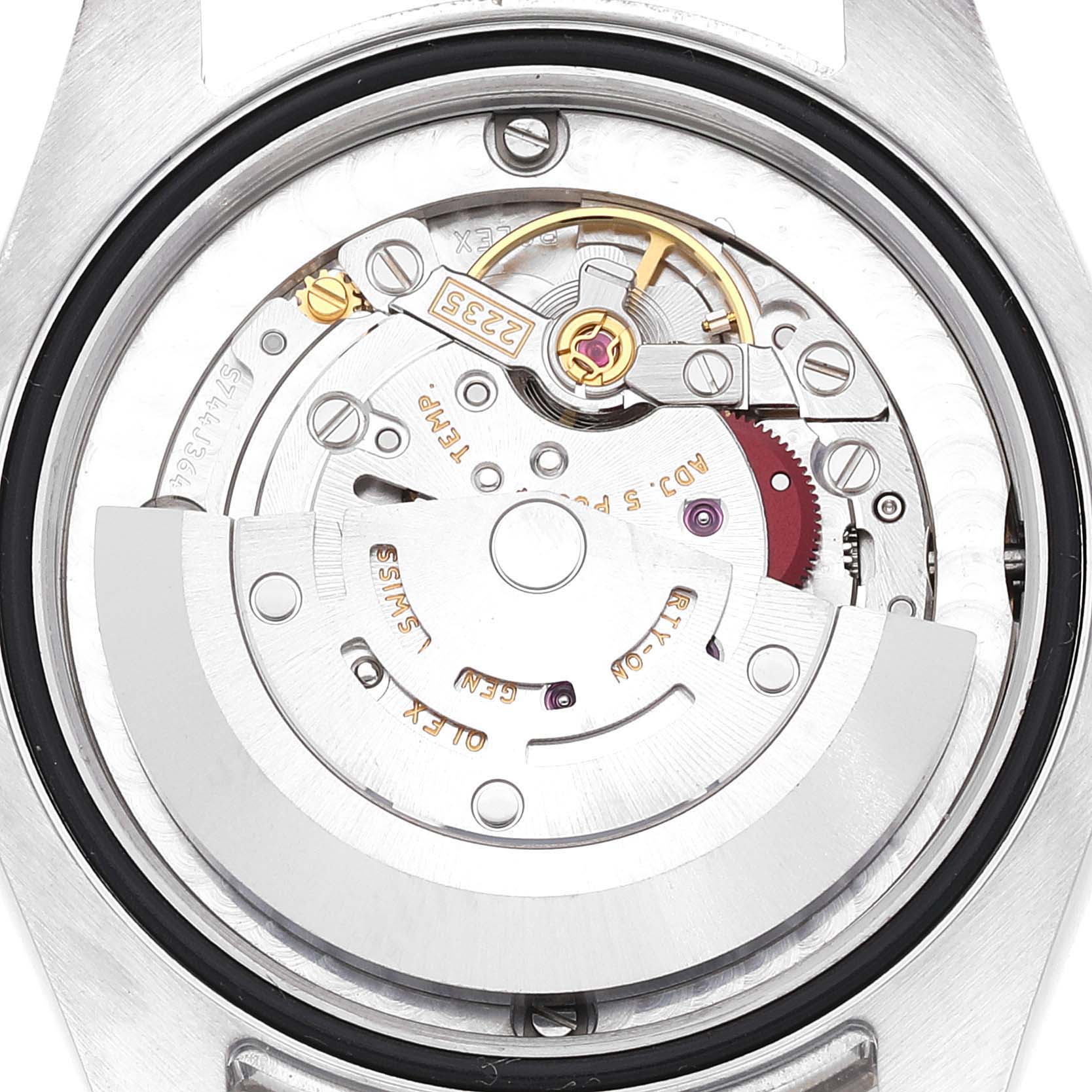 This image shows the internal movement mechanism of a Mid-Size Rolex watch from a top-down angle.