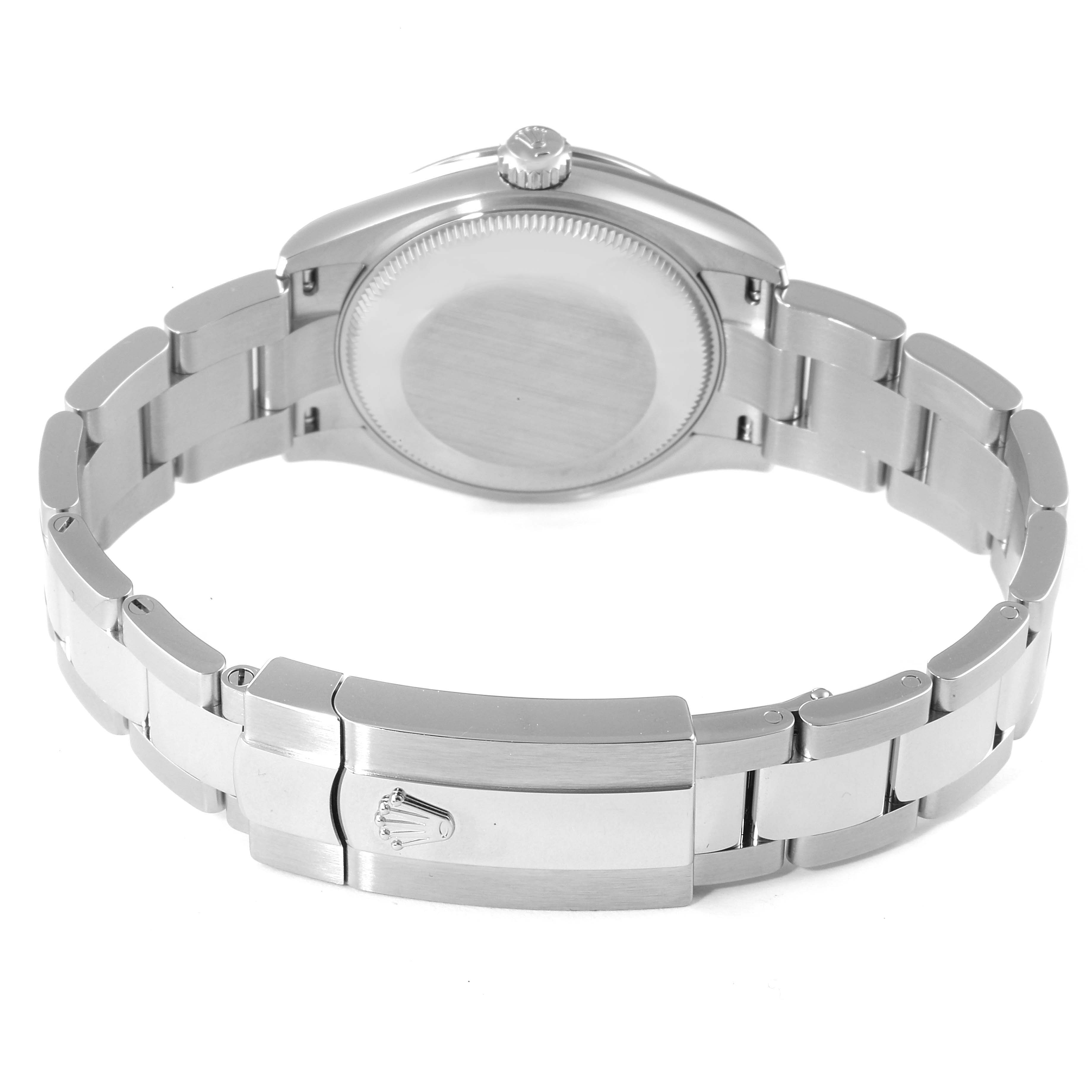 This image shows the back case, crown, and bracelet clasp of the Mid-Size Rolex watch.