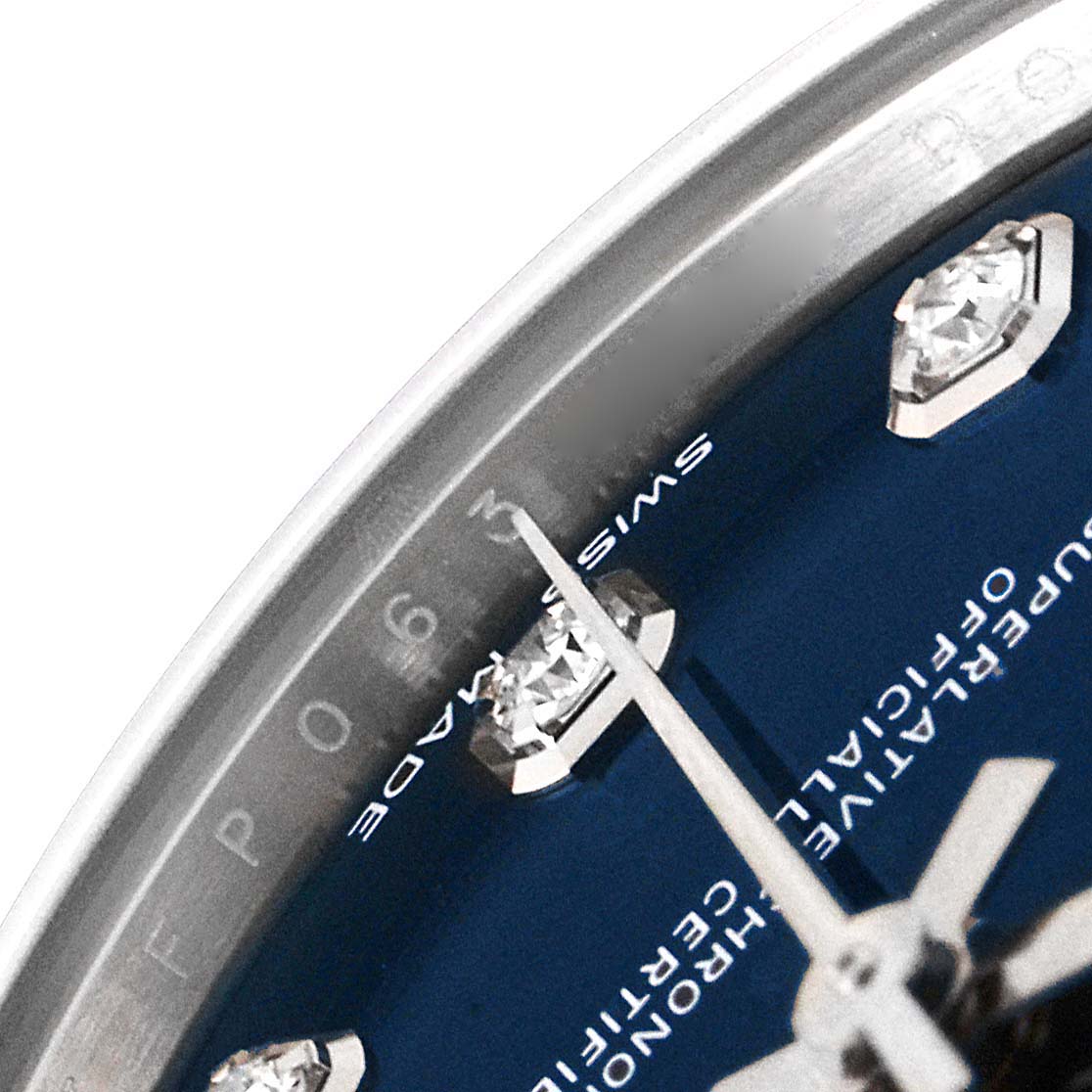 This close-up angle of the Rolex Mid-Size 178274 Women
s Stainless Steel Blue Dial 178274 Women
s Stainless Steel Blue Dial model shows the dial with diamond markers and the text "SWISS MADE" partially visible.