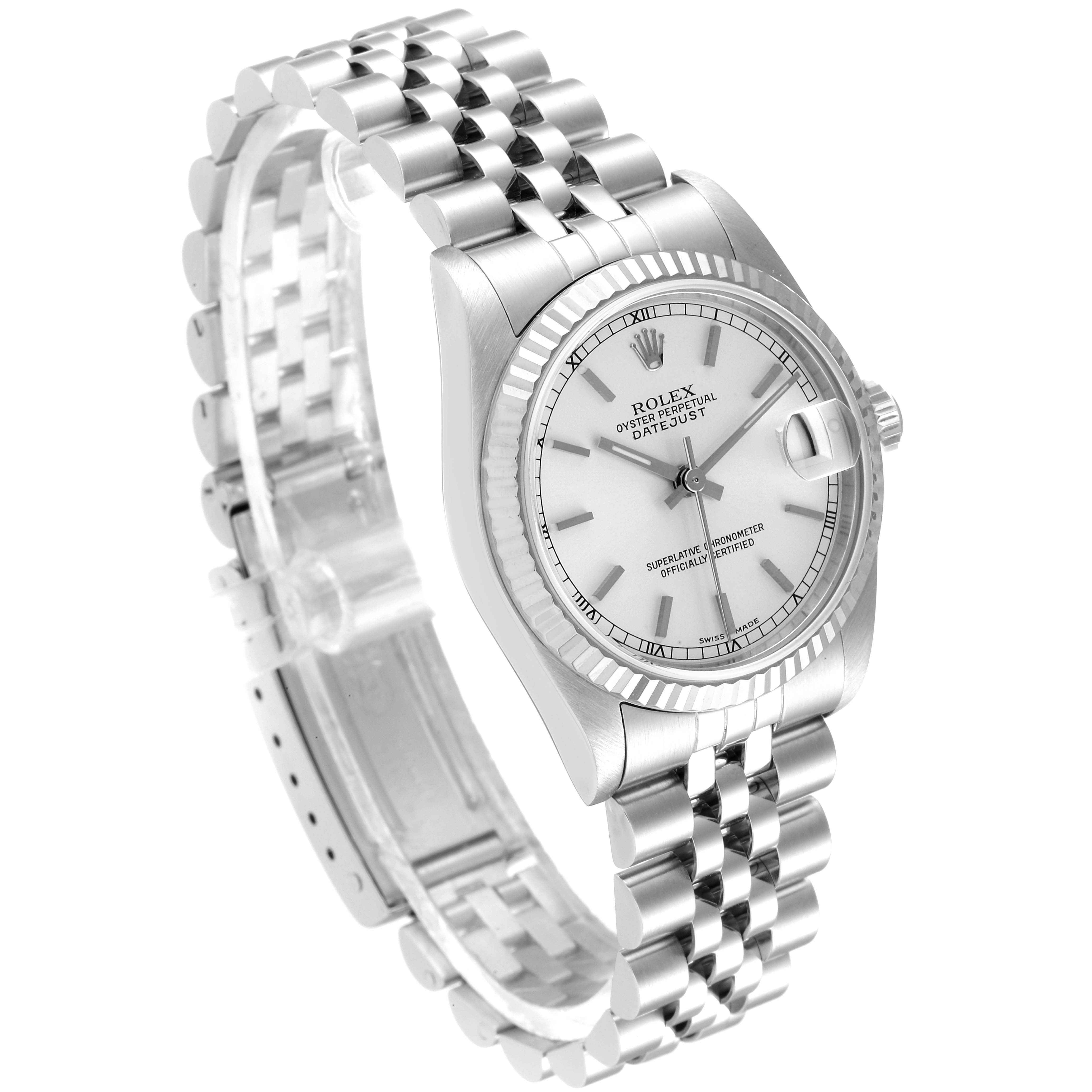 This image shows a Rolex Mid-Size 78274 Women's Stainless Steel Silver Dial 78274 Women's Stainless Steel Silver Dial Datejust watch at a 3/4 angle, showcasing the watch face, fluted bezel, and jubilee bracelet.