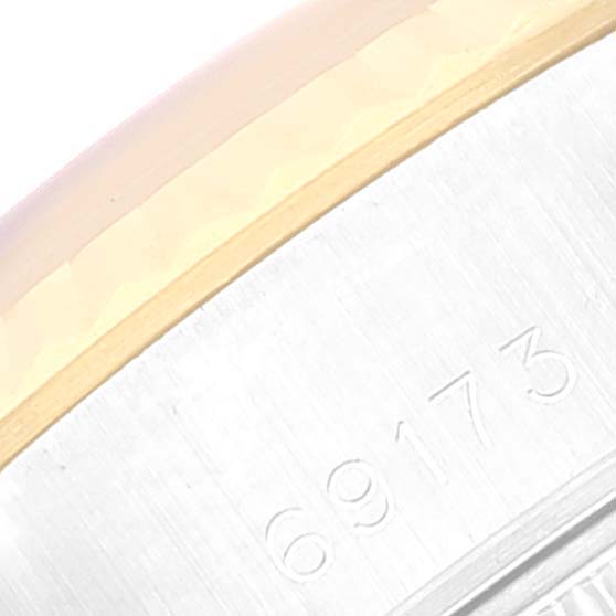 This image shows a close-up of the model number 69173 engraved on the side of a Rolex Datejust 69173 Women's Steel and Gold (two tone) Silver Dial 69173 Women's Steel and Gold (two tone) Silver Dial watch case.