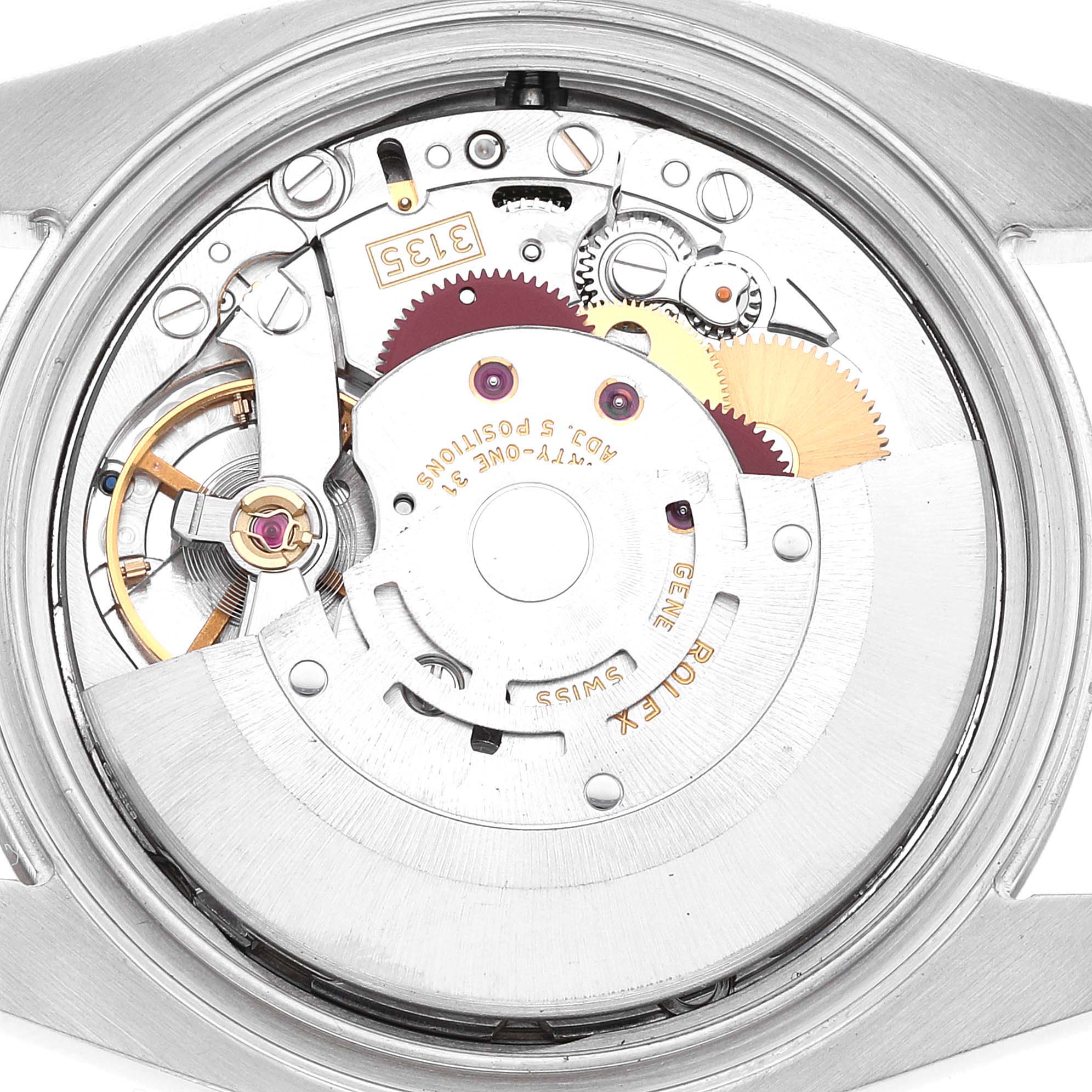 This image shows a close-up view of the movement of a Rolex Datejust 116234 Men's Stainless Steel Silver Dial 116234 Men's Stainless Steel Silver Dial watch, revealing its intricate internal mechanics.