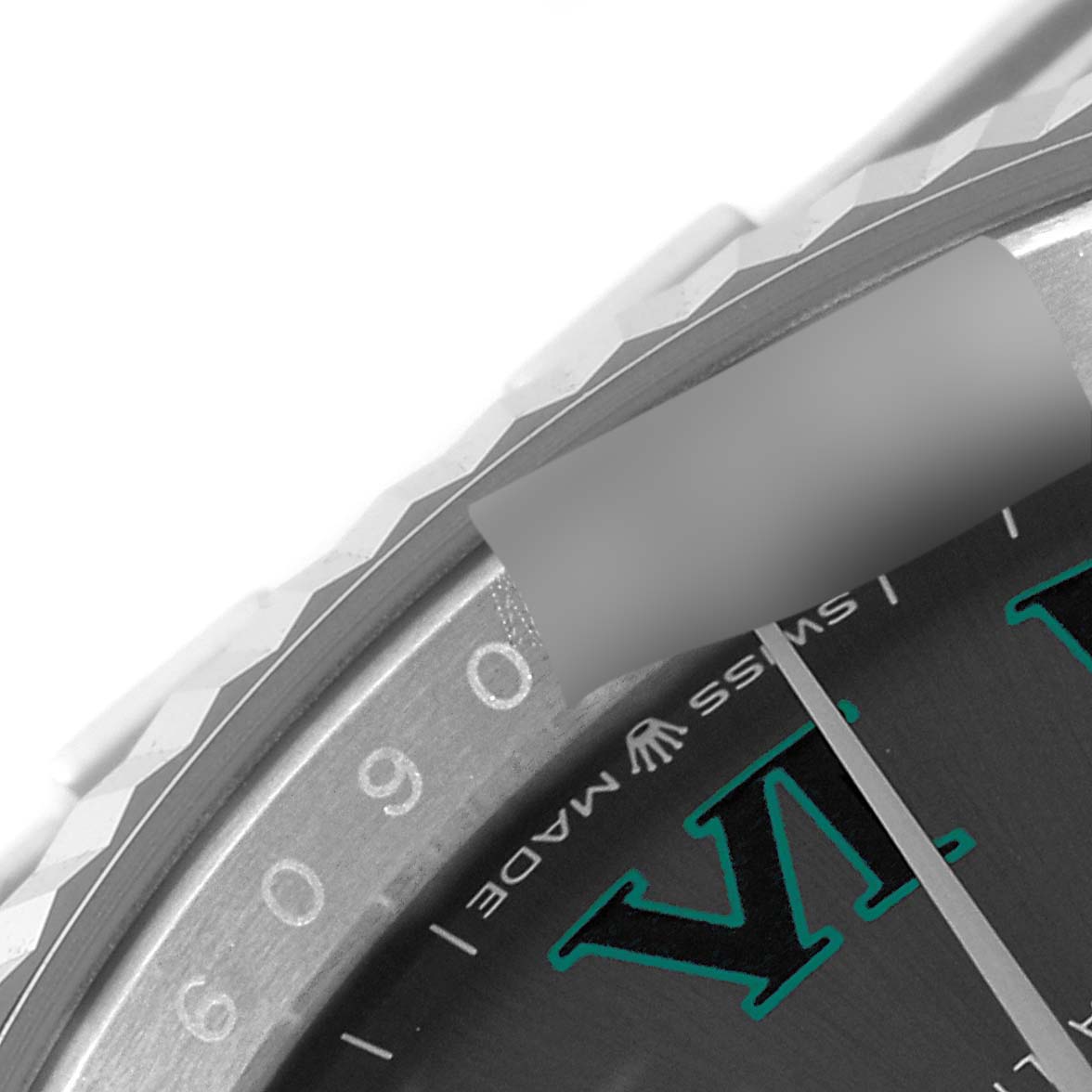The image shows a close-up of the bezel and part of the dial of a Rolex Datejust 126234 Men's Stainless Steel Grey Dial 126234 Men's Stainless Steel Grey Dial watch.