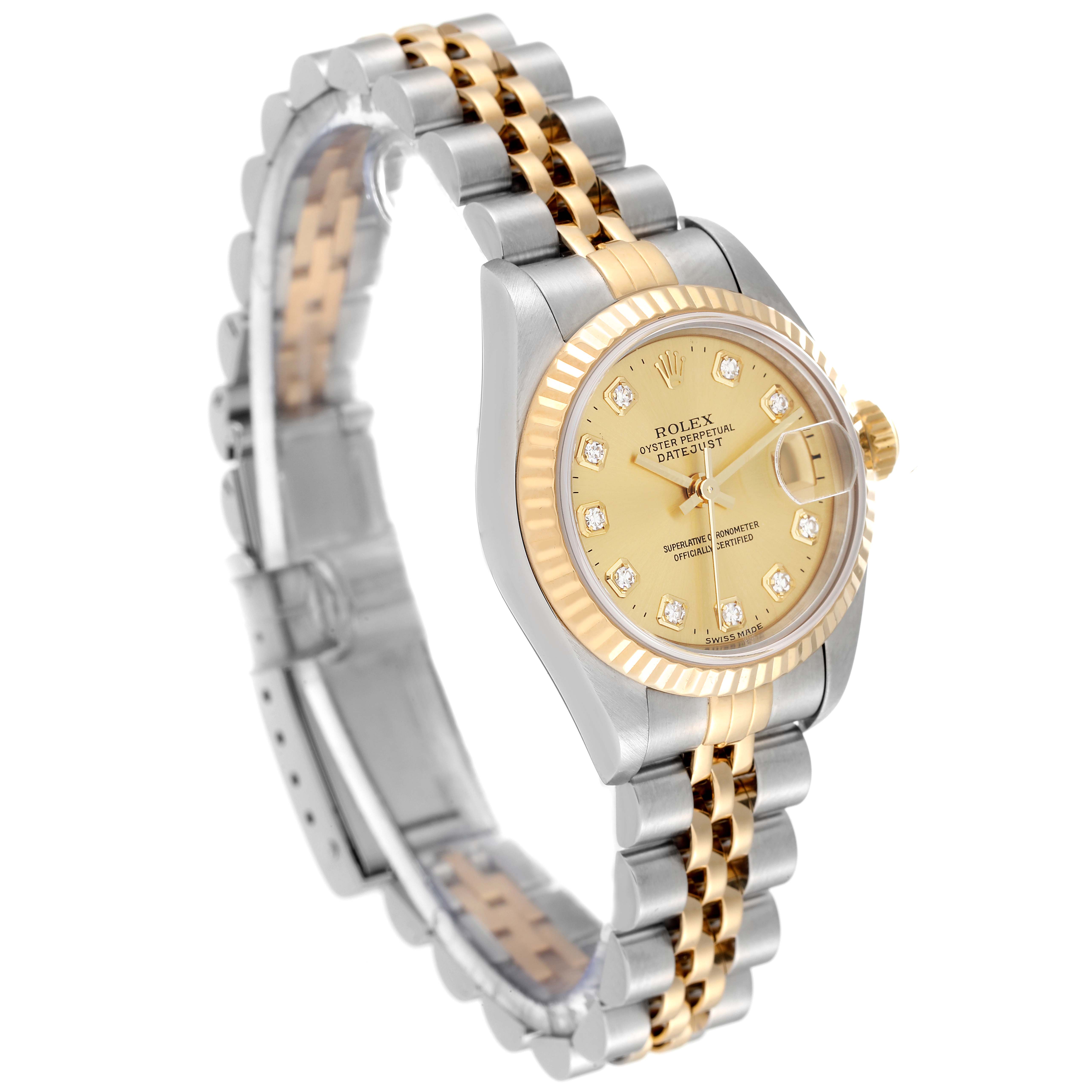 The Rolex Datejust 79173 Women's Steel and Gold (two tone) Champagne Dial 79173 Women's Steel and Gold (two tone) Champagne Dial watch is shown at a slight angle, highlighting its dial, bezel, and two-tone bracelet.
