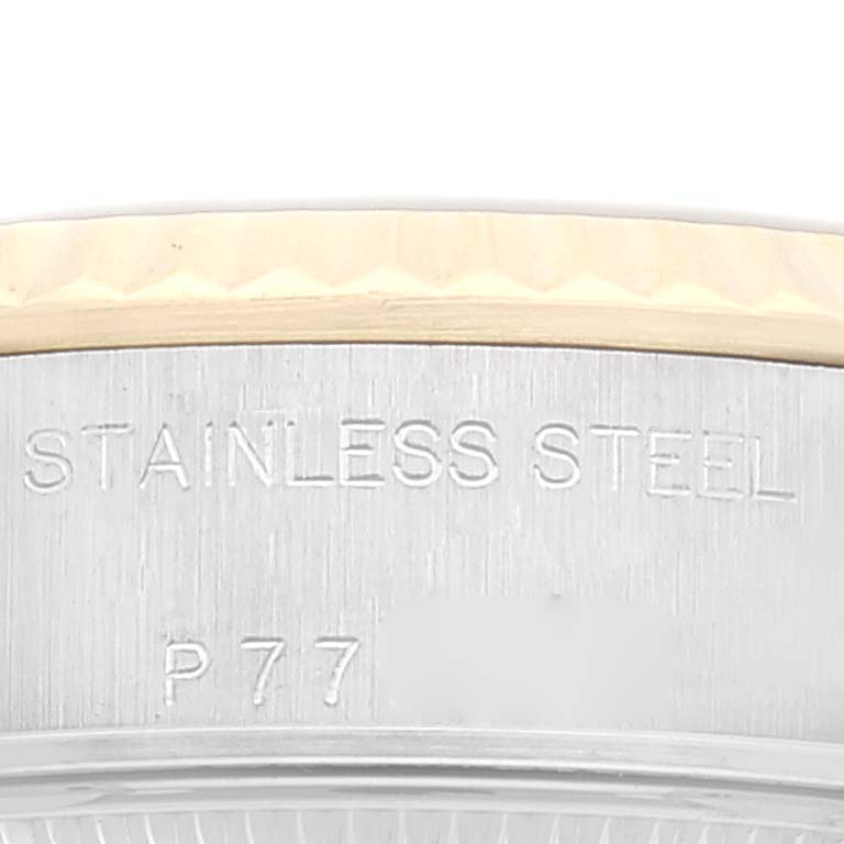 This image shows a close-up of the side of the case of a Rolex Datejust 79173 Women's Steel and Gold (two tone) Champagne Dial 79173 Women's Steel and Gold (two tone) Champagne Dial watch, highlighting the stainless steel material.