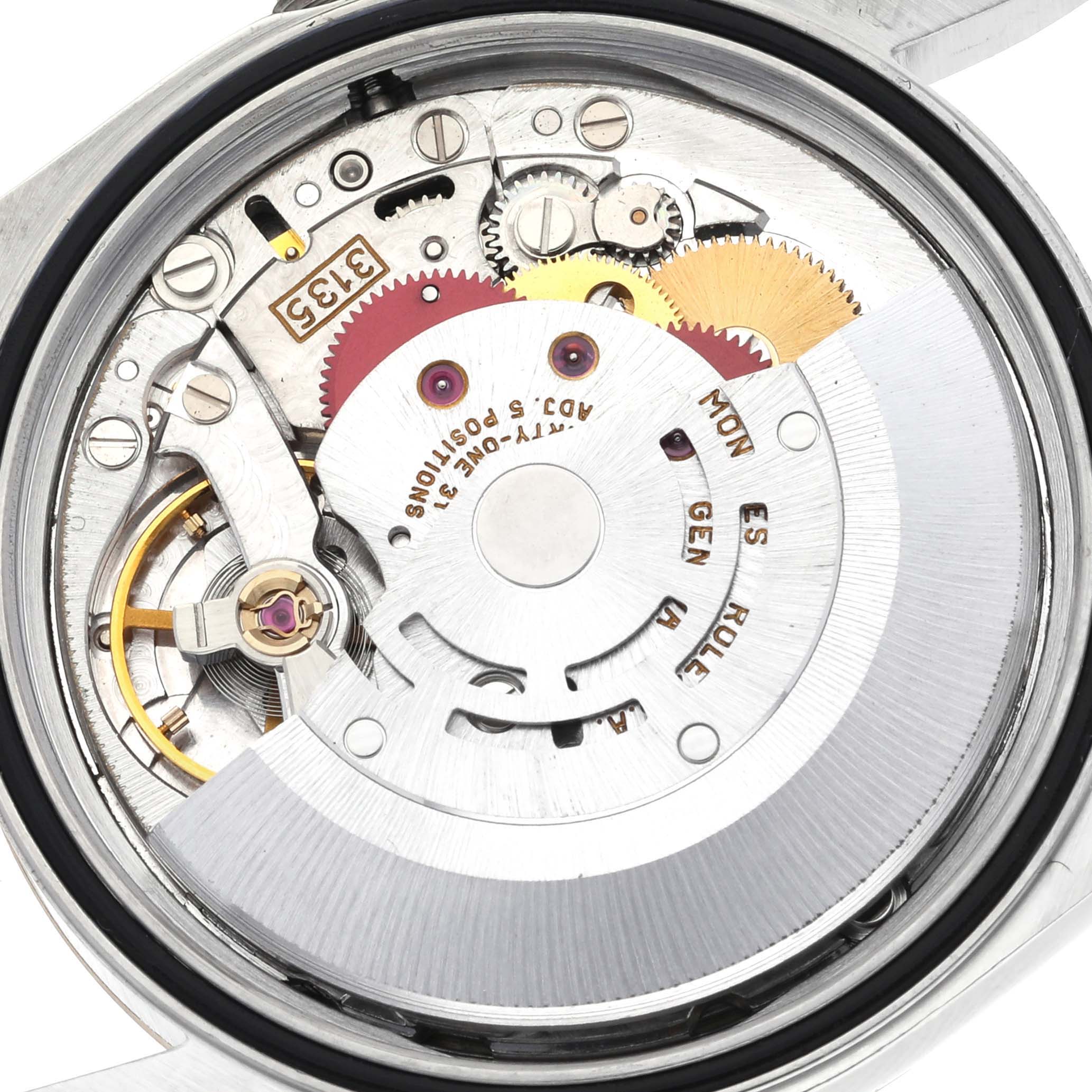 The image shows the internal mechanism of a Rolex Datejust 16233 Men's Steel and Gold (two tone) Champagne Dial 16233 Men's Steel and Gold (two tone) Champagne Dial watch from a top-down angle, highlighting gears and components.