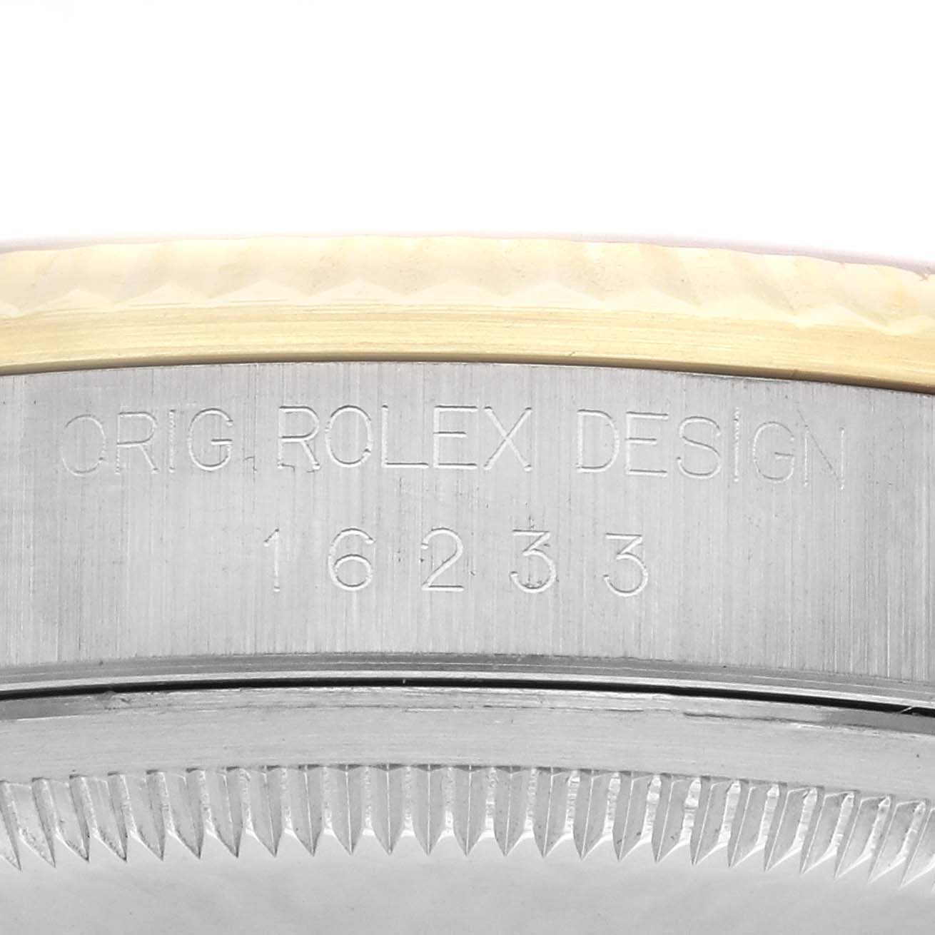 The image shows a close-up of the side casing of a Rolex Datejust 16233 Men's Steel and Gold (two tone) Champagne Dial 16233 Men's Steel and Gold (two tone) Champagne Dial, highlighting the model number.