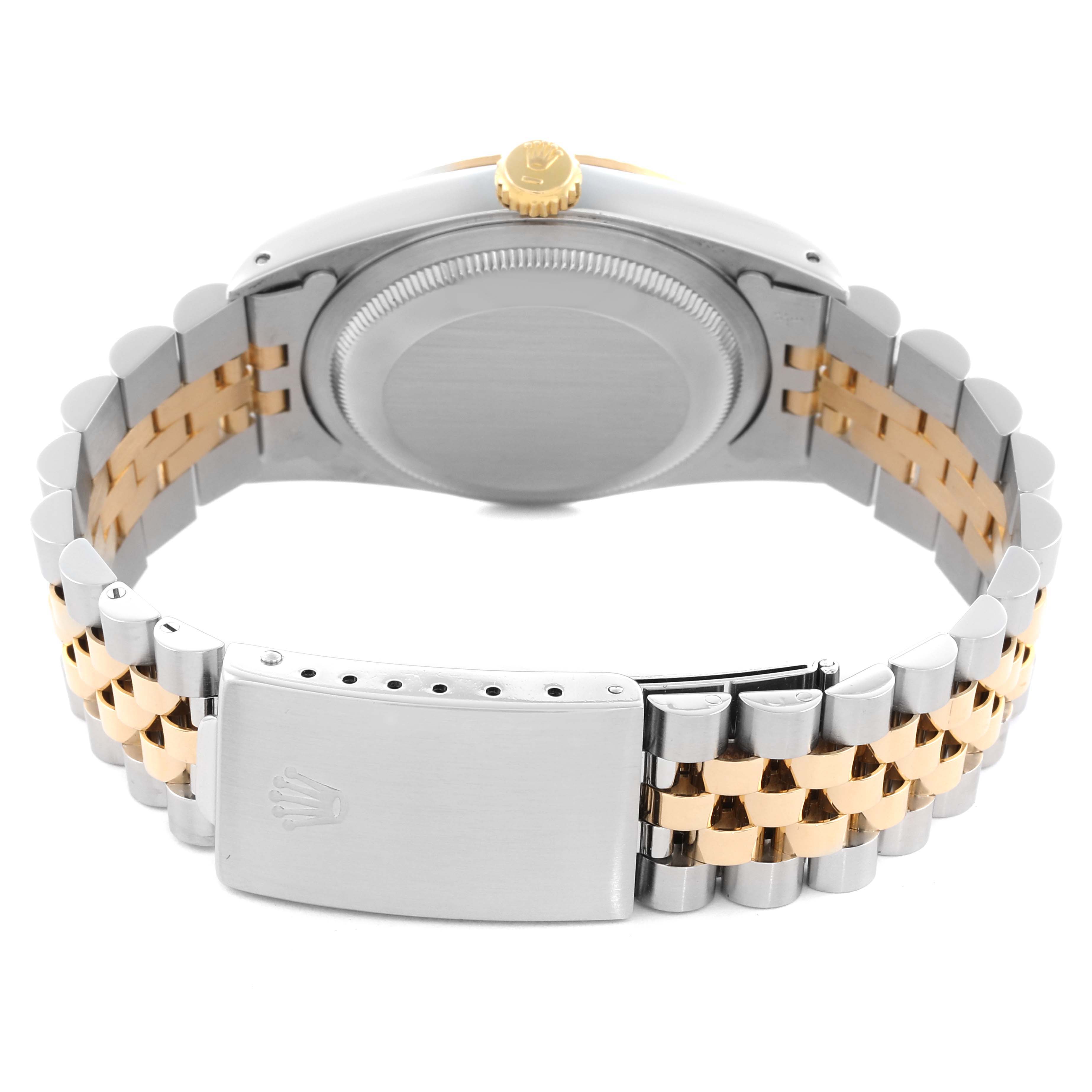 The image shows the back of the Rolex Datejust 16233 Men's Steel and Gold (two tone) Champagne Dial 16233 Men's Steel and Gold (two tone) Champagne Dial watch, highlighting the case back, crown, and two-tone bracelet with clasp.