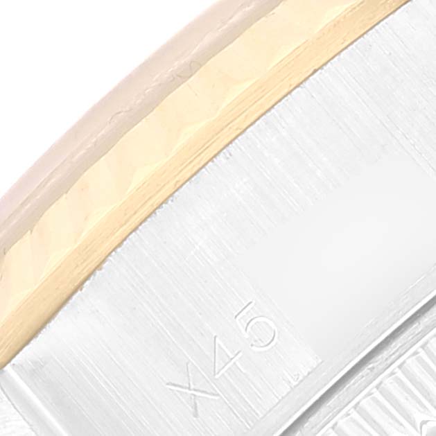 The image shows a close-up view of the side of the bezel and case of a Rolex Datejust 69173 Women's Steel and Gold (two tone) Black Dial 69173 Women's Steel and Gold (two tone) Black Dial watch.