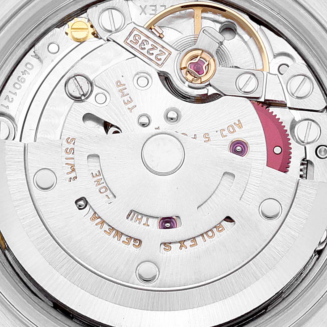Close-up of the movement and inner mechanics of a Rolex Datejust 79173 Women's Steel and Gold (two tone) Mother of Pearl Dial 79173 Women's Steel and Gold (two tone) Mother of Pearl Dial watch, showing intricate gears and components.