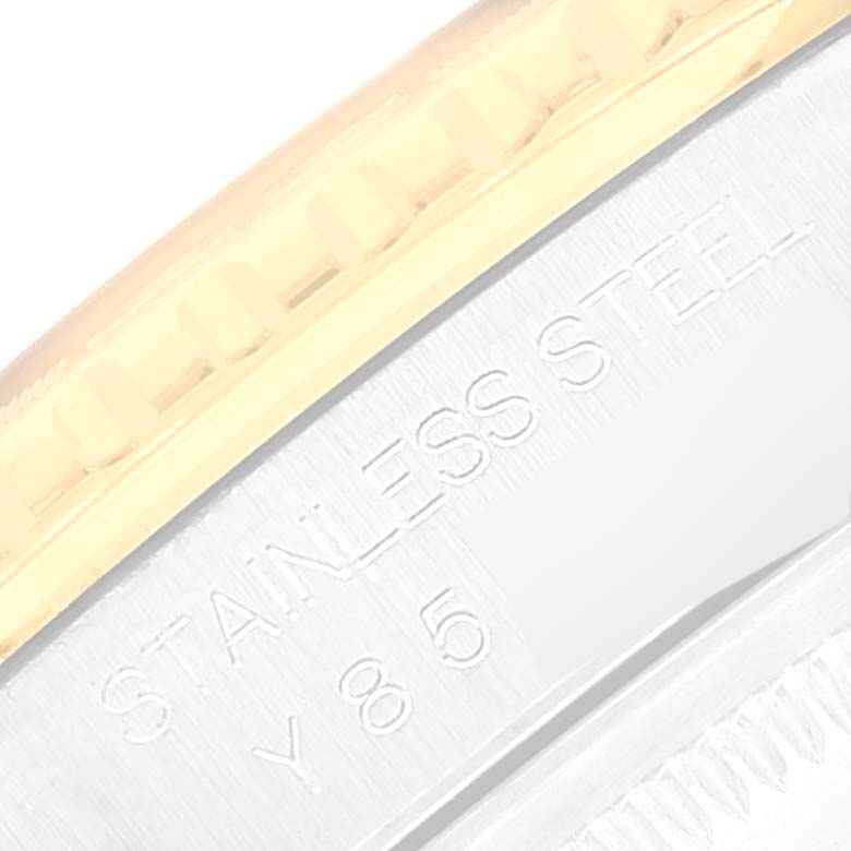 This close-up image of a Rolex Turn-o-Graph 16263 Men's Steel and Gold (two tone) Mother of Pearl Dial 16263 Men's Steel and Gold (two tone) Mother of Pearl Dial watch shows the stainless steel engraving and part of the bezel.