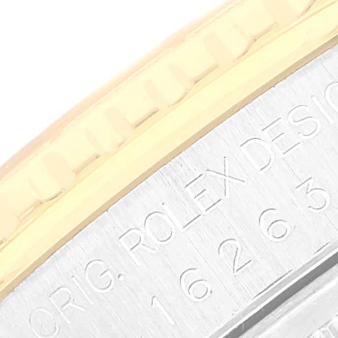 The image shows a close-up of the bezel and part of the case of a Rolex Turn-o-Graph 16263 Men's Steel and Gold (two tone) Mother of Pearl Dial 16263 Men's Steel and Gold (two tone) Mother of Pearl Dial watch.