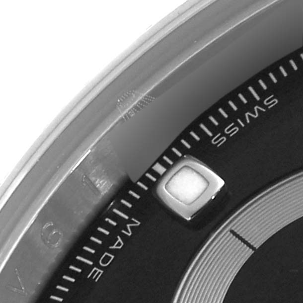The image shows a close-up of the dial edge and "SWISS MADE" text on the Rolex Daytona 116520 Men's Stainless Steel Black Dial 116520 Men's Stainless Steel Black Dial watch.