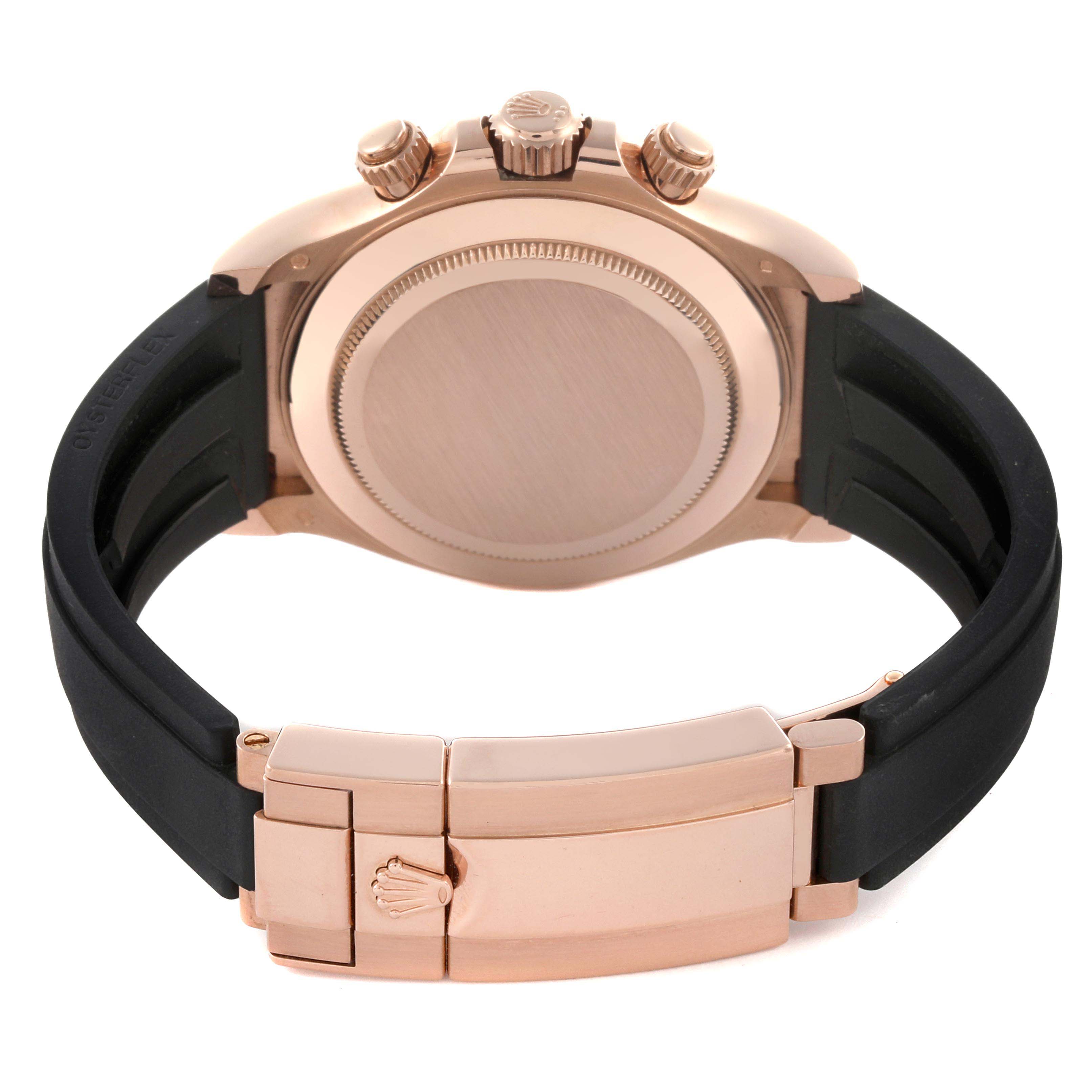 The image shows the back view of a Rolex Daytona 116515 Men's Rose Gold Black Dial 116515 Men's Rose Gold Black Dial watch, highlighting the case back and clasp of the strap.