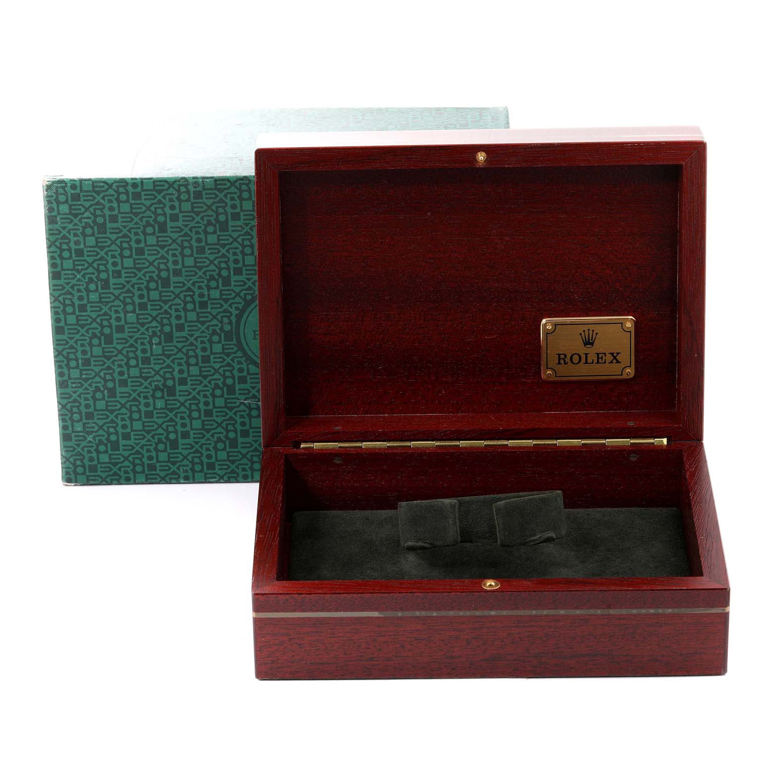 The image shows an open wooden Rolex box for the Daytona model, featuring the brand's logo inside.