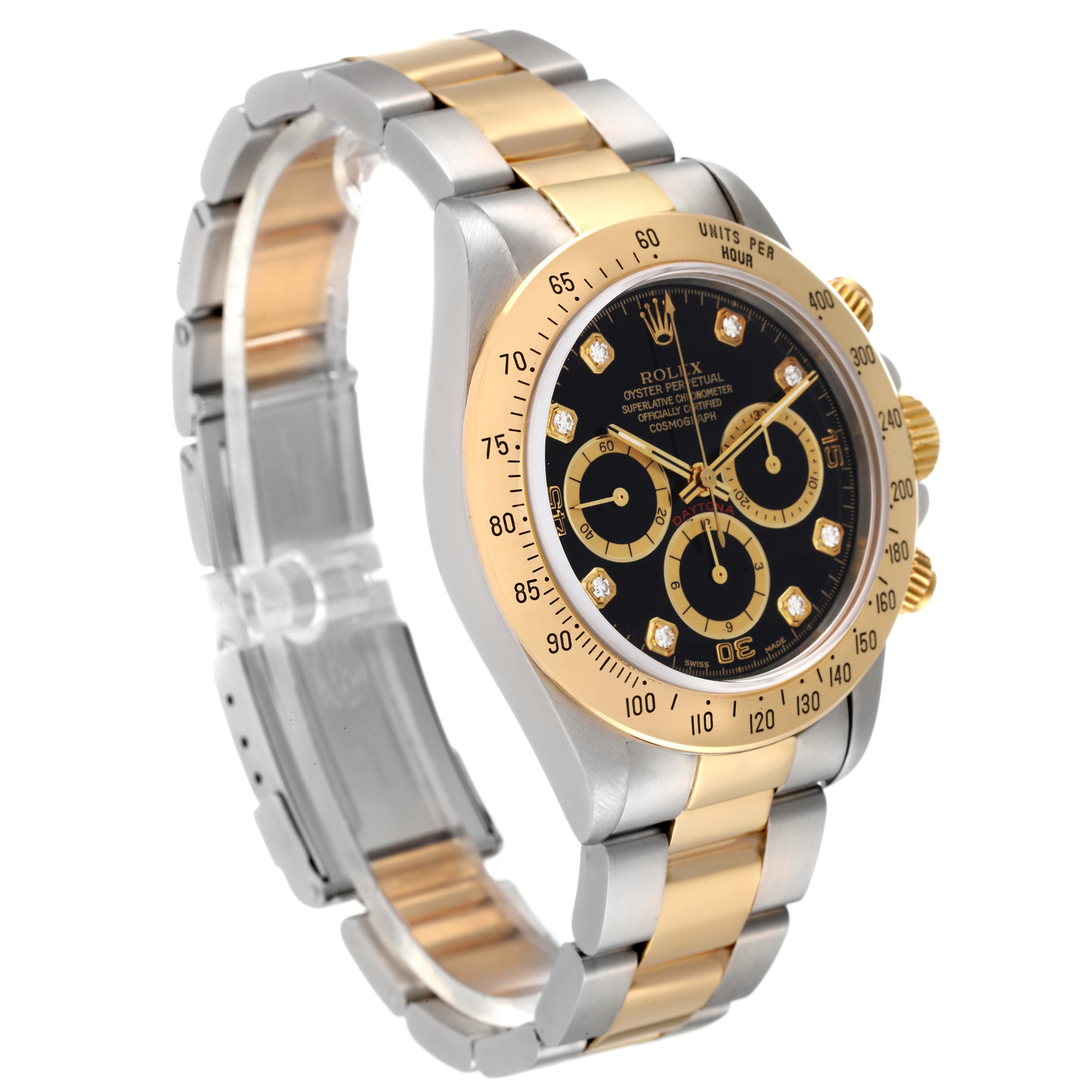 This image displays a Rolex Daytona 16523 Men's Steel and Gold (two tone) Black Dial 16523 Men's Steel and Gold (two tone) Black Dial watch from an oblique angle, highlighting its dial, bezel, and two-tone bracelet.