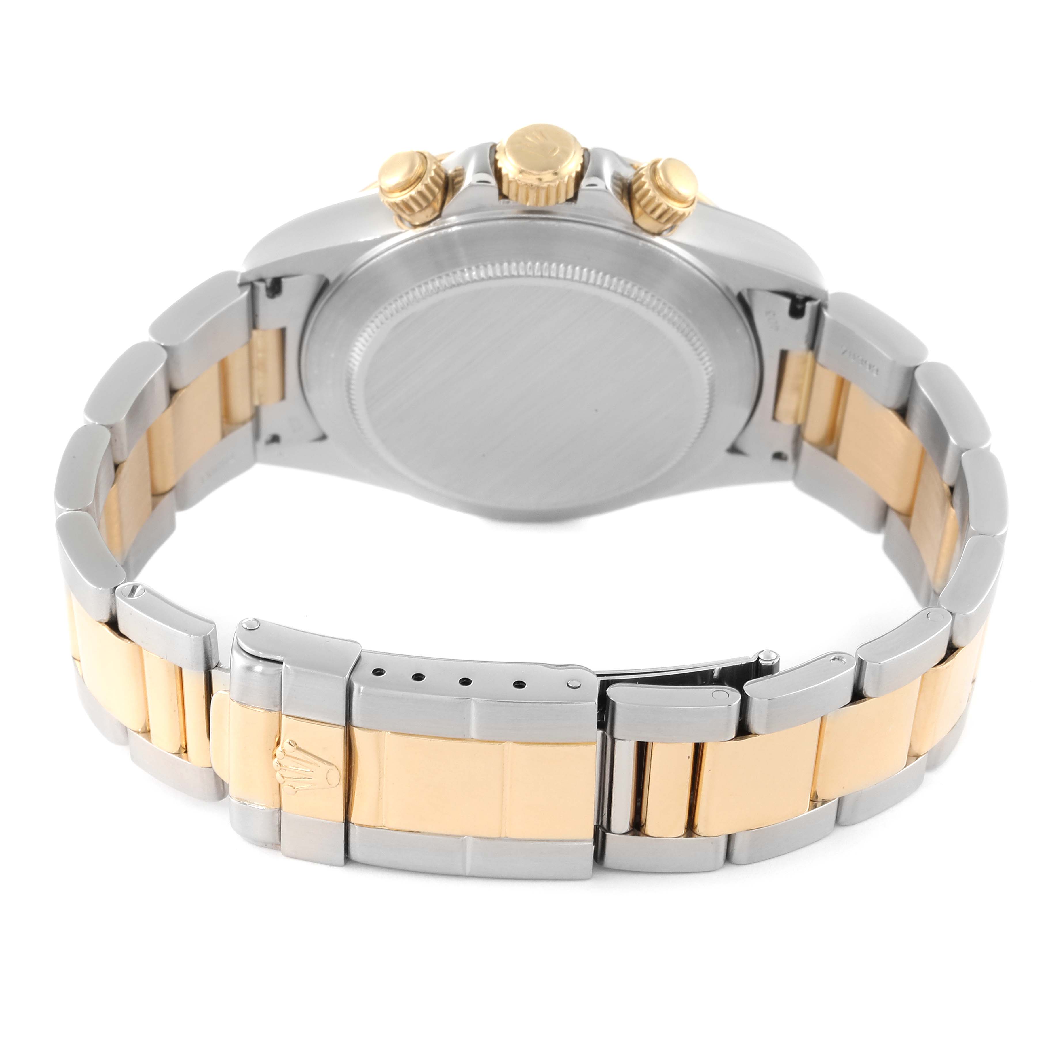 The image shows the back view of a Rolex Daytona 16523 Men's Steel and Gold (two tone) Black Dial 16523 Men's Steel and Gold (two tone) Black Dial watch, focusing on the case, crown, and two-tone bracelet.