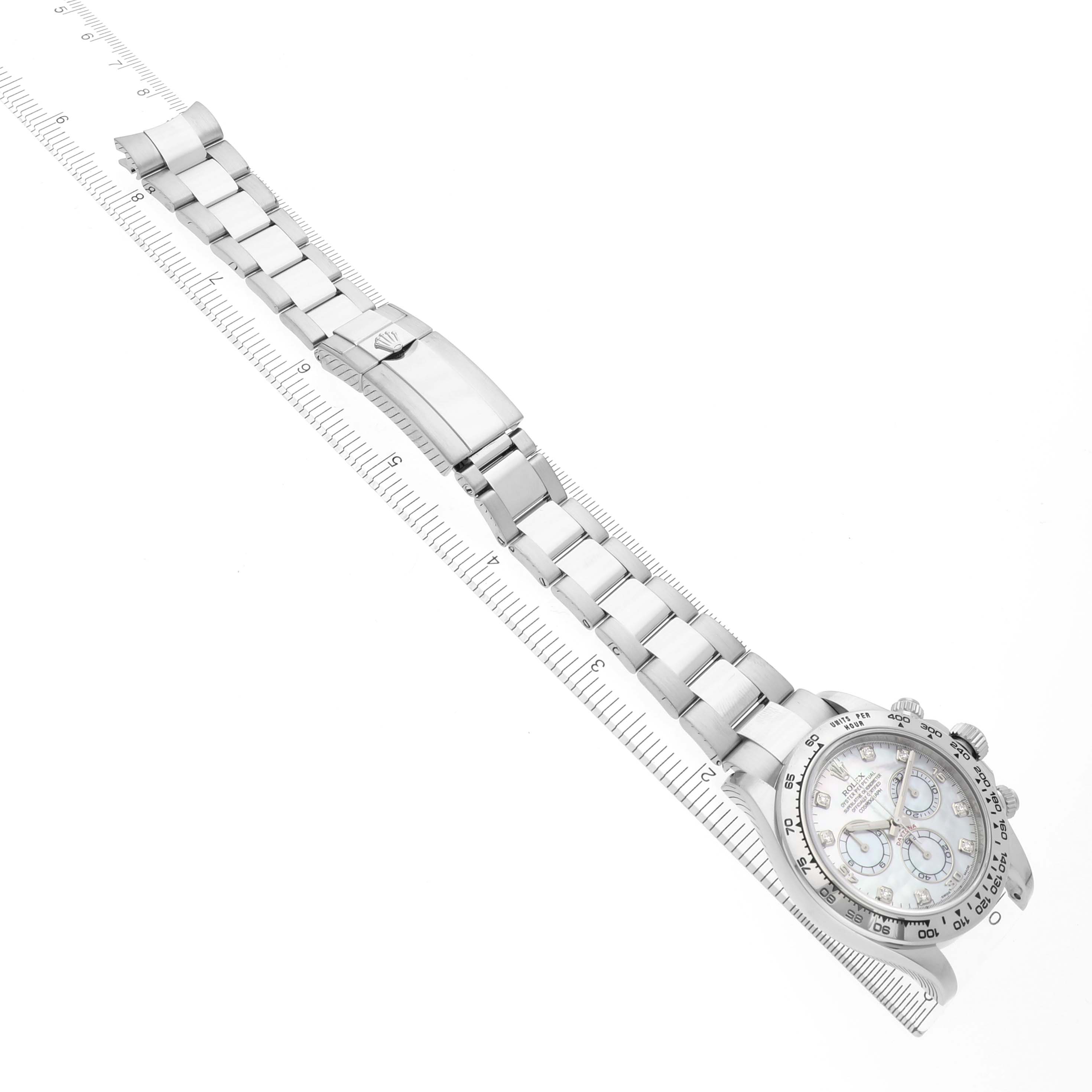 The Rolex Daytona 116509 Men
s White Gold Mother of Pearl Dial watch is shown at an angle highlighting the full bracelet, clasp, and face with visible dials and bezel.