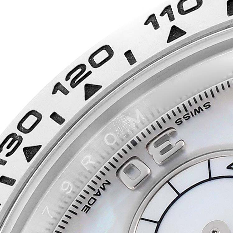 The image shows a close-up of the bezel and partial dial of a Rolex Daytona 116509 Men
s White Gold Mother of Pearl Dial, highlighting the tachymetric scale.