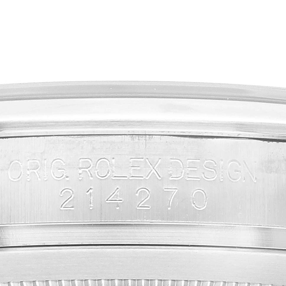 This image shows the case back of a Rolex Explorer 214270 Men
s Stainless Steel Black Dial 214270 Men
s Stainless Steel Black Dial watch with the model number 214270 engraved on it.