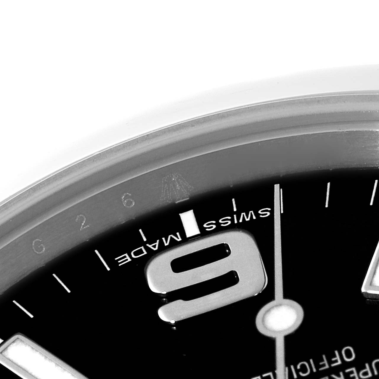 This image shows a close-up of the dial, bezel, and numeral 9 on a Rolex Explorer 214270 Men
s Stainless Steel Black Dial 214270 Men
s Stainless Steel Black Dial model watch.