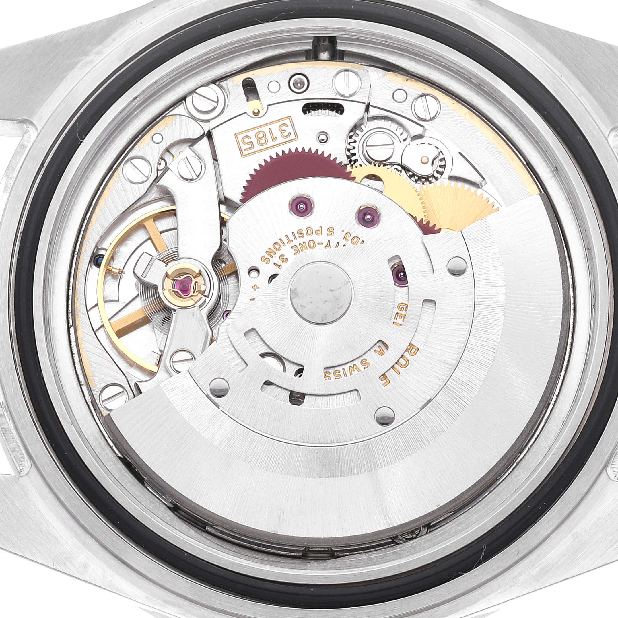 This image shows the internal mechanism of a Rolex Explorer 16570 Men's Stainless Steel White Dial 16570 Men's Stainless Steel White Dial watch seen from the back, highlighting gears and other components.